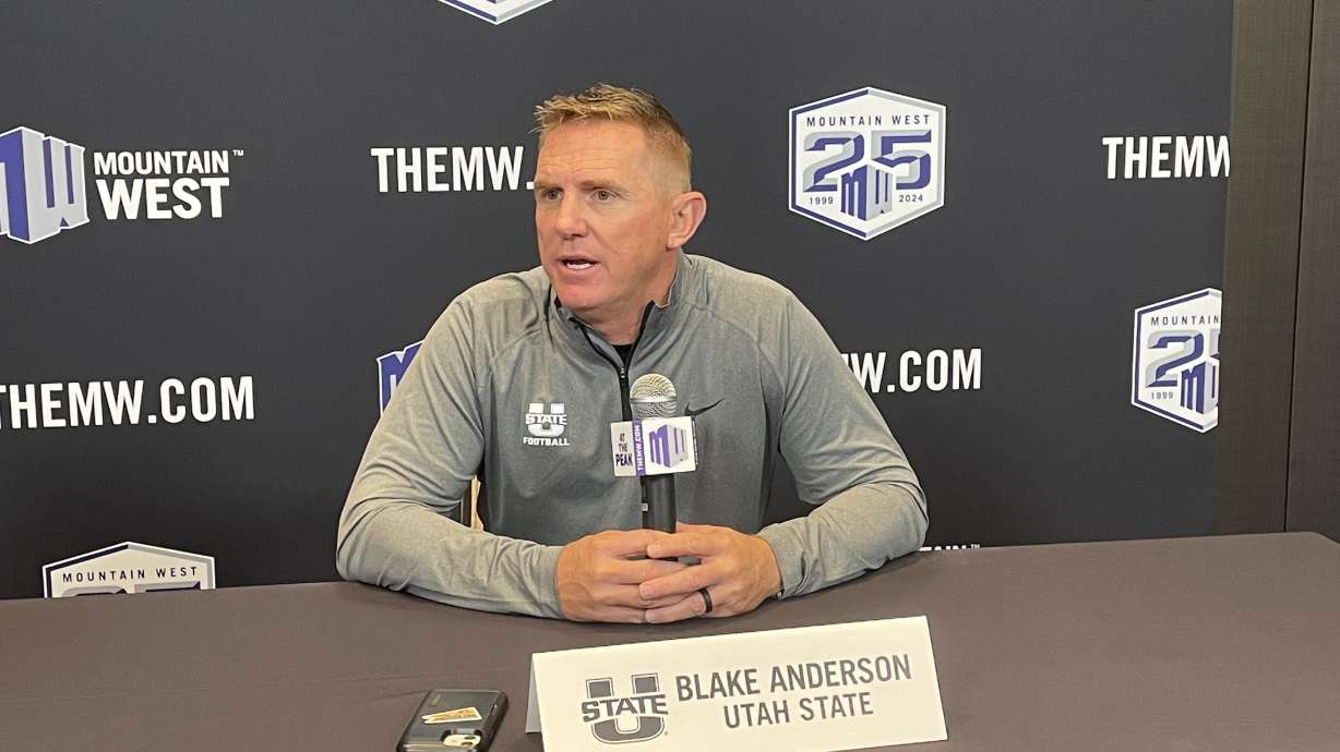Utah State head coach Blake Anderson speaks with media during a Mountain West media day session in Las Vegas ahead of the 2023 season.