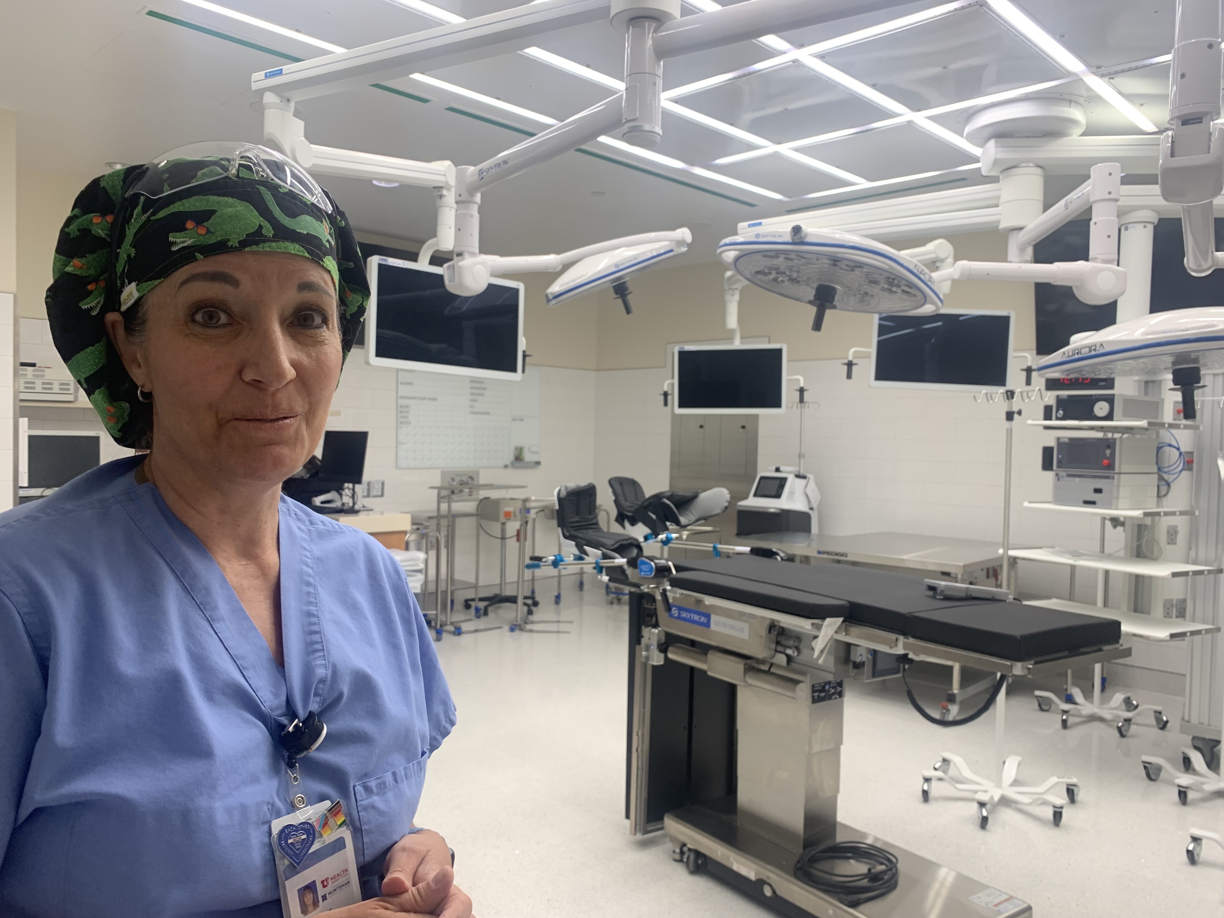 Julie Howells talks about how an operating room is set up on Wednesday. The operating rooms in the Kathryn F. Kirk Center, an expansion of the Huntsman Cancer Institute, are preparing to open.
