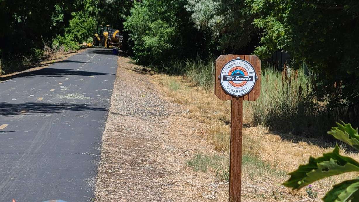 Police identified a woman who died after getting crushed by a tree while biking the Rio Grande Trail in Clearfield Wednesday evening. The trail is closed through Friday for debris clean up.