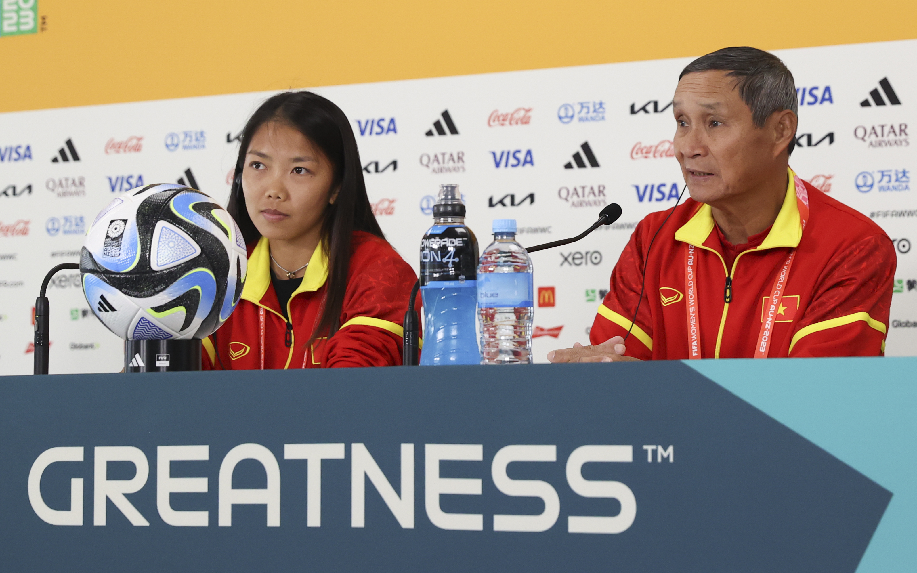 Vietnam captain Huynh Nhu and team coach Mai Duc Chung speak at a press conference a day ahead of the team's first match in the Women's World Cup in Auckland, New Zealand, Friday, July 21, 2023. Vietnam will play the United States on Saturday July 22. 