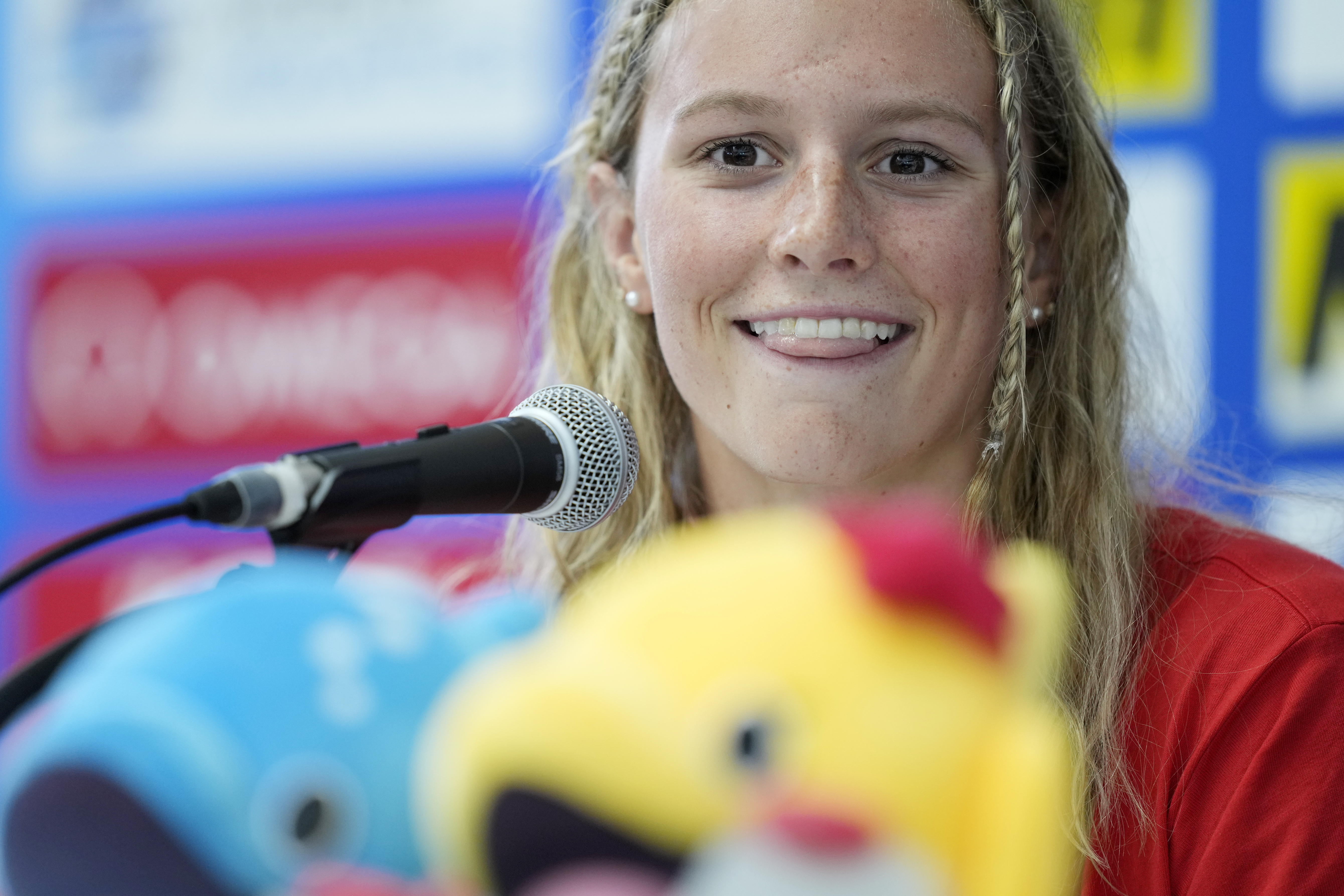Summer McIntosh of Canada smiles during a press conference at the World Swimming Championships in Fukuoka, Japan,Friday, July 21, 2023. One of the greatest freestylers the sport has ever seen, Katie Ledecky is up against two younger stars: 16-year-old Canadian Summer McIntosh and 22-year-old Australian Ariarne Titmus. 