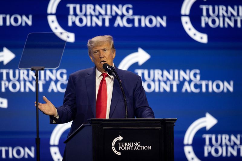 Former President and Republican presidential candidate Donald Trump speaks in West Palm Beach, Florida July 15. Trump's trial over his alleged mishandling of classified documents will begin on May 20 next year