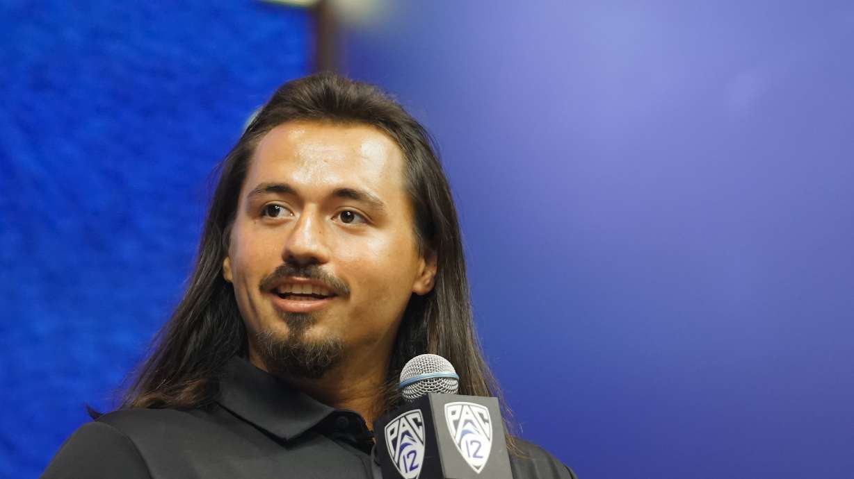 Utah quarterback Cameron Rising speaks at the NCAA college football Pac-12 media day Friday, July 21, 2023, in Las Vegas.