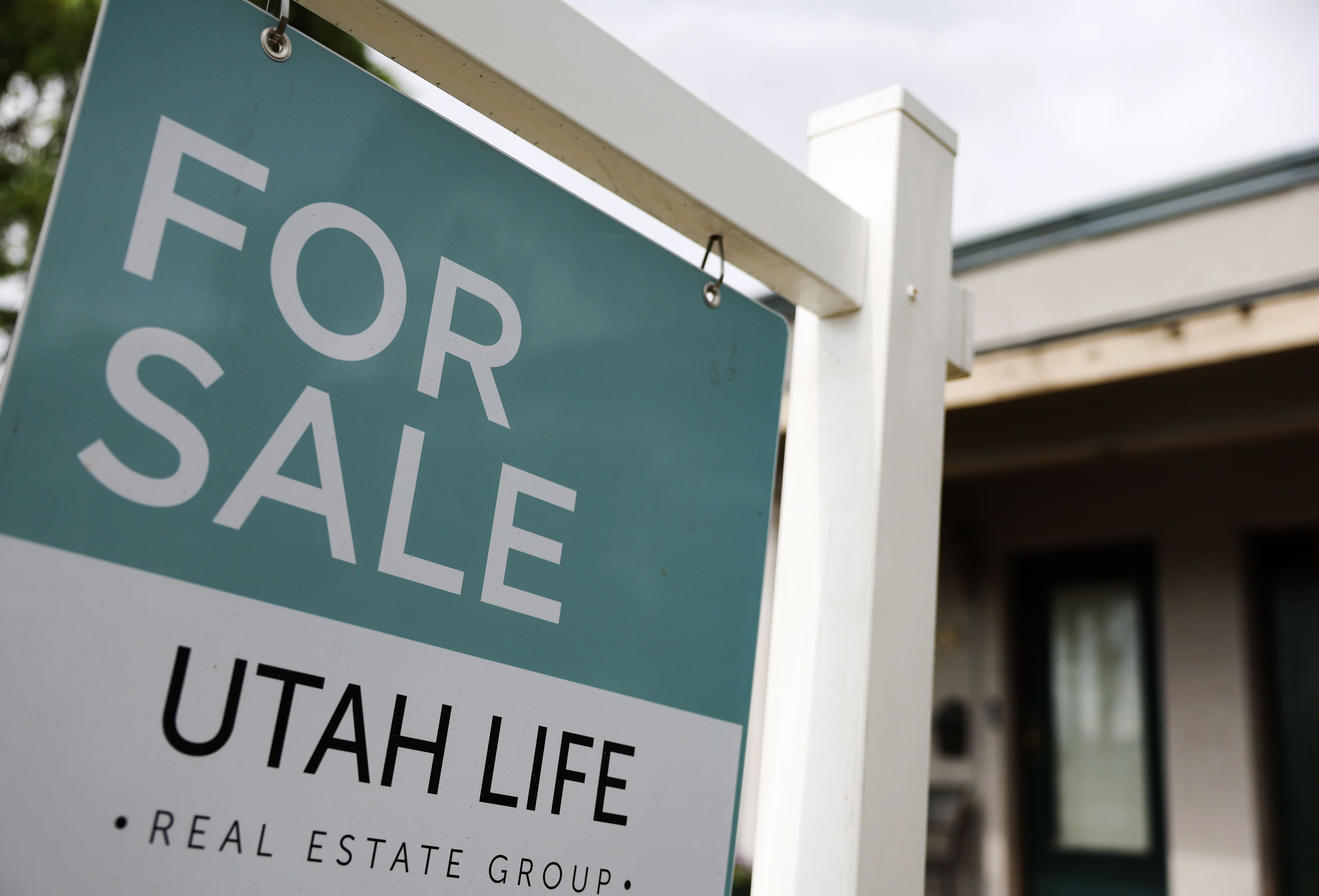 A “For sale” sign is posted on a property in Salt Lake City on June 29, 2022. Salt Lake City has the largest share of Generation Z home shoppers in the nation, according to a report by LendingTree. 