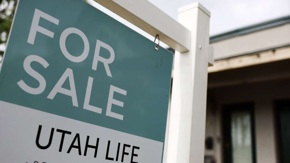 A “For sale” sign is posted on a property in Salt Lake City on June 29, 2022. Salt Lake City has the largest share of Generation Z home shoppers in the nation, according to a report by LendingTree.