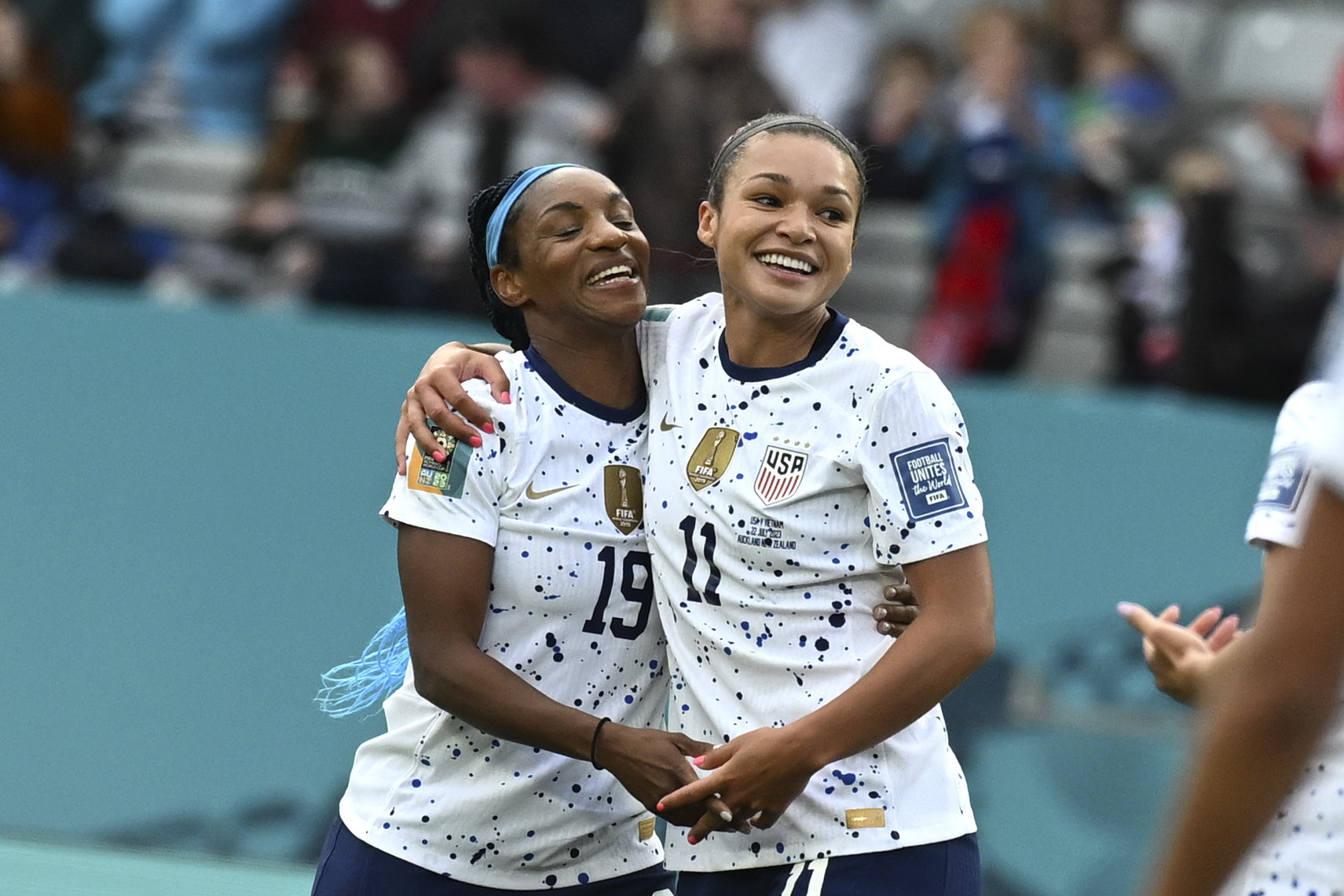 United States' Sophia Smith, right, celebrates with United States' Crystal Dunn after scoring her side's 2nd goal during the Women's World Cup Group E soccer match between the United States and Vietnam at Eden Park in Auckland, New Zealand, Saturday, July 22, 2023. 