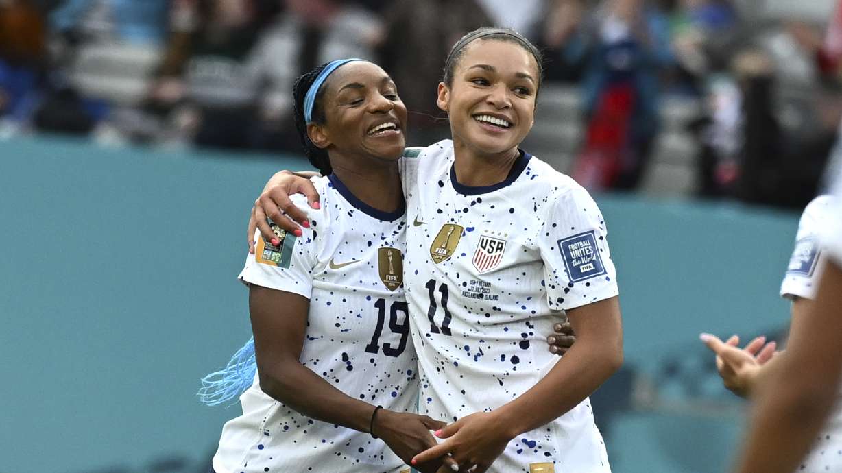 United States' Sophia Smith, right, celebrates with United States' Crystal Dunn after scoring her side's 2nd goal during the Women's World Cup Group E soccer match between the United States and Vietnam at Eden Park in Auckland, New Zealand, Saturday, July 22, 2023.