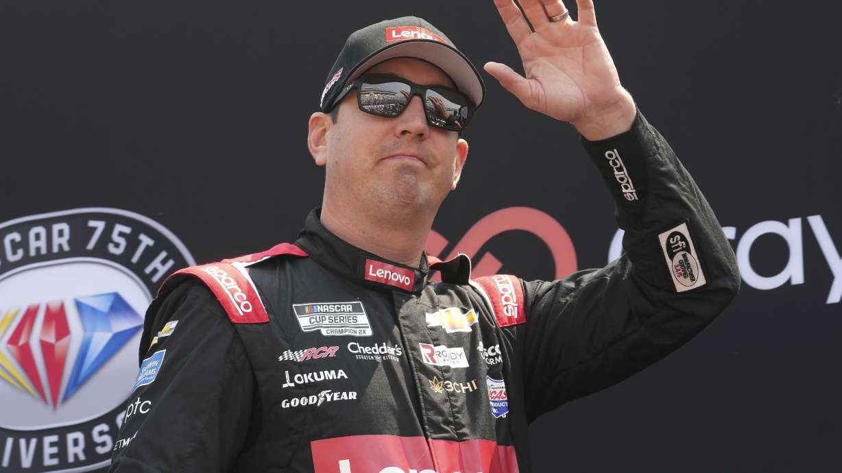FILE - NASCAR Cup Series driver Kyle Busch is introduced before the Crayon 301 NASCAR Cup Series race, Monday, July 17, 2023, at New Hampshire Motor Speedway, in Loudon, N.H. Denny Hamlin and Busch return to Pocono Raceway a year after they suffered disqualifications and had their 1-2 finishes thrown out.