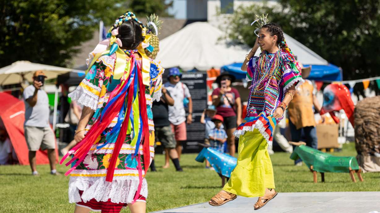Girls from Oaxaca en Utah perform at La Guelaguetza at Heritage Park in Kaysville on Saturday. La Guelaguetza is an event held to celebrate the rich culture and traditions of Oaxaca, Mexico.