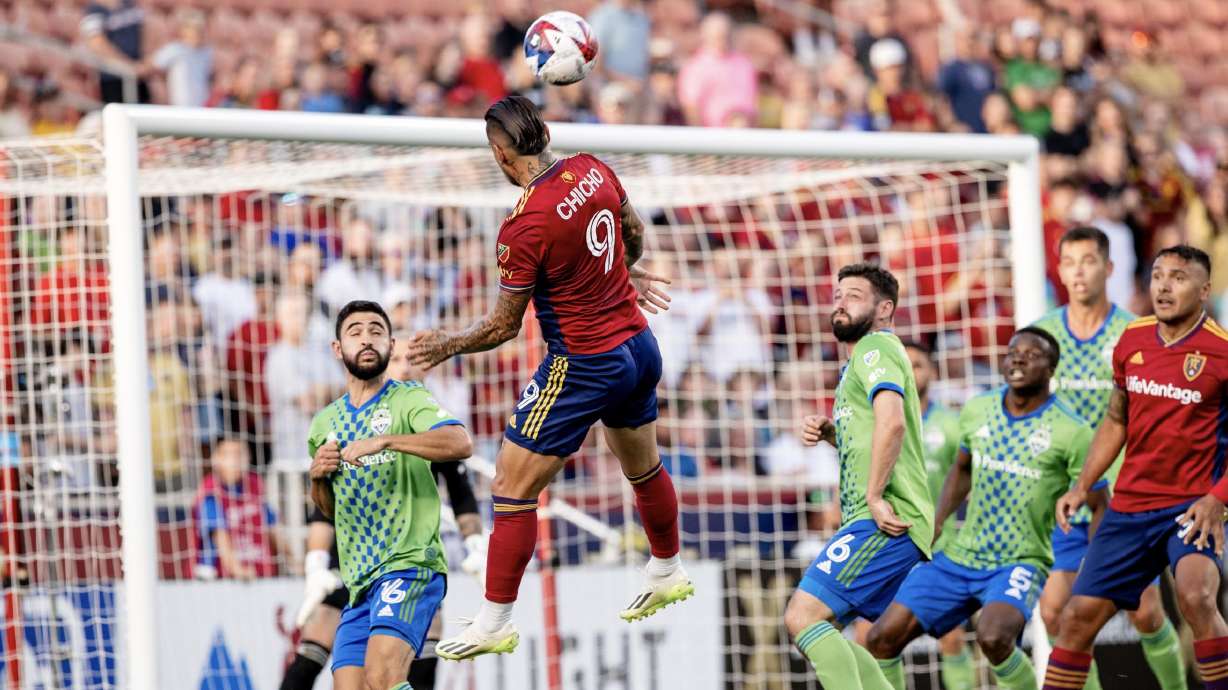 Chicho Arango heads the ball against Seattle at America First Field.