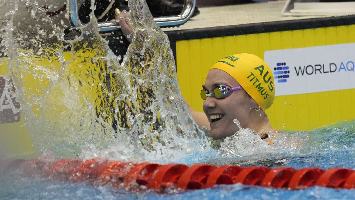 Ariarne Titmus of Australia celebrates after finishing Women 400m Freestyle finals at the World Swimming Championships in Fukuoka, Japan, Sunday, July 23, 2023.