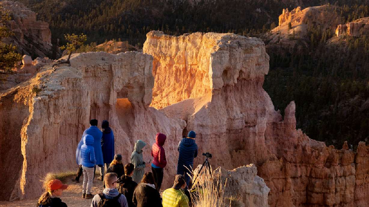 People visit Bryce Canyon National Park on May 18. Extreme heat appears to be leading to the deaths of people in America's national parks at an alarming pace this year, a report says.