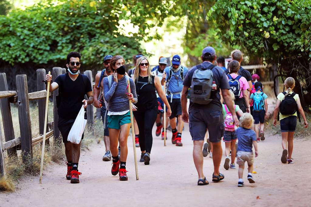 Visitors hike at Zion National Park on Oct. 14, 2020.