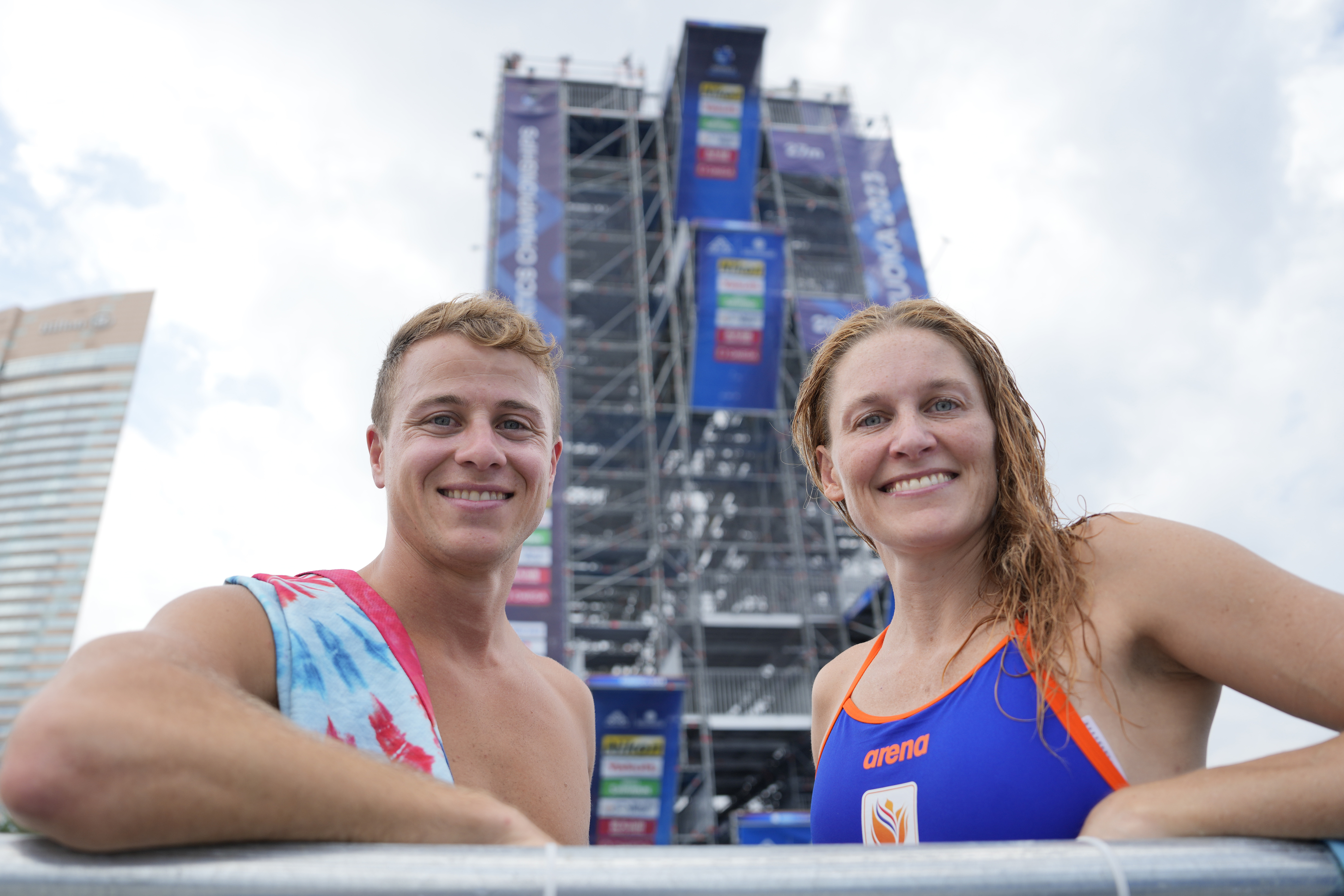 Matt Cooper, left, of the Unites States and his wife Ginni van Katwijk, right, of the Netherlands pose during a practice session of high diving at the World Swimming Championships at Seaside Momochi Beach Park in Fukuoka, Japan,Saturday, July 22, 2023. 
