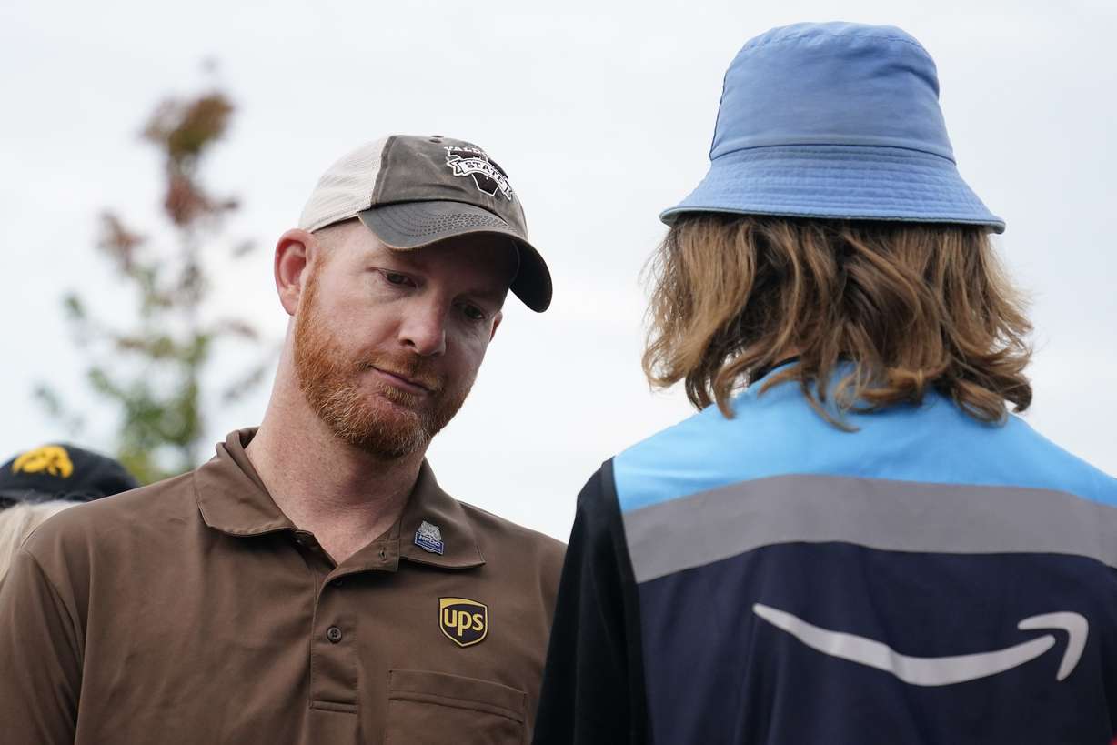 UPS teamsters and workers hold a rally Friday in Atlanta, as a national strike deadline nears. The Teamsters said Friday that they will resume contract negotiations with UPS, marking an end to a stalemate that began two weeks ago when both sides walked away from talks while blaming each other.