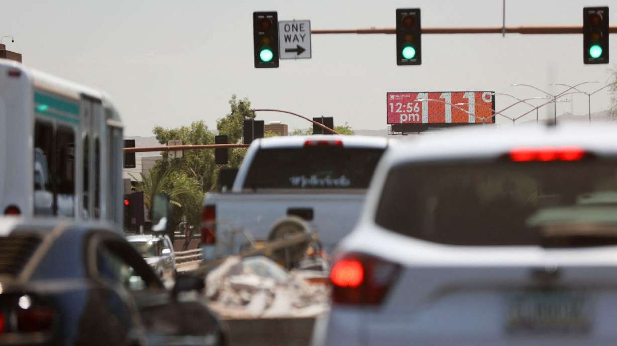 A billboard displays the temperature as Phoenix breaks heat record of 19 consecutive days above 110 degrees Fahrenheit, in Phoenix on July 18.