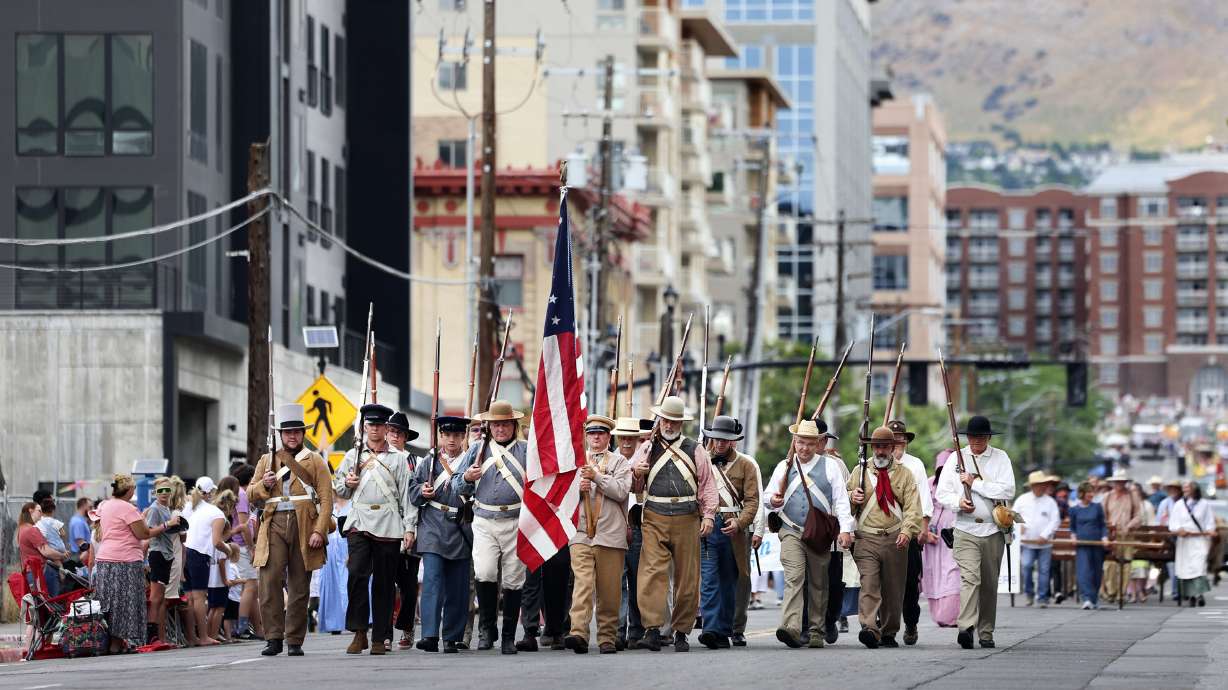The Mormon Battalion walks in the Days of '47 Parade in Salt Lake City on Monday.