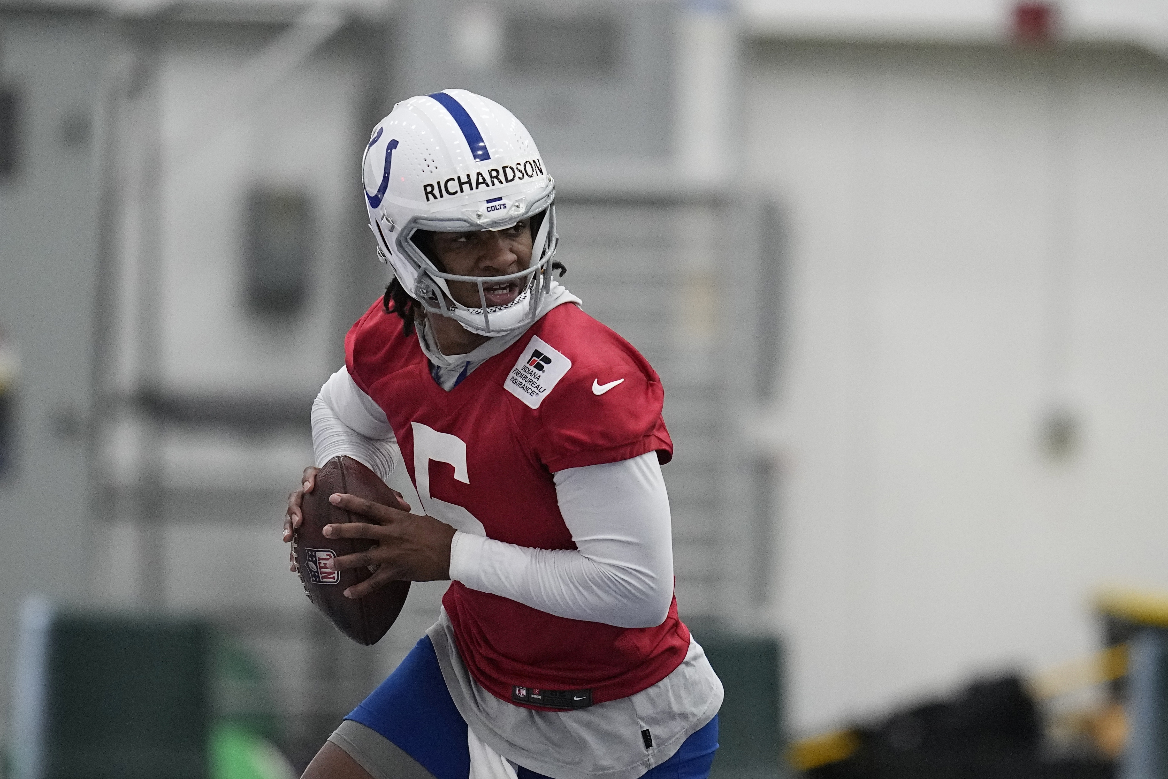 FILE - Indianapolis Colts quarterback Anthony Richardson participates in a drill during NFL football practice, Tuesday, June 13, 2023, in Indianapolis. The Indianapolis Colts will start this season with another new quarterback behind center. The big question is who will it be? After parting ways with veterans Matt Ryan and Nick Foles after one season, the Colts signed former NFL starter Gardner Minshew and drafted Richardson with the fourth overall pick.