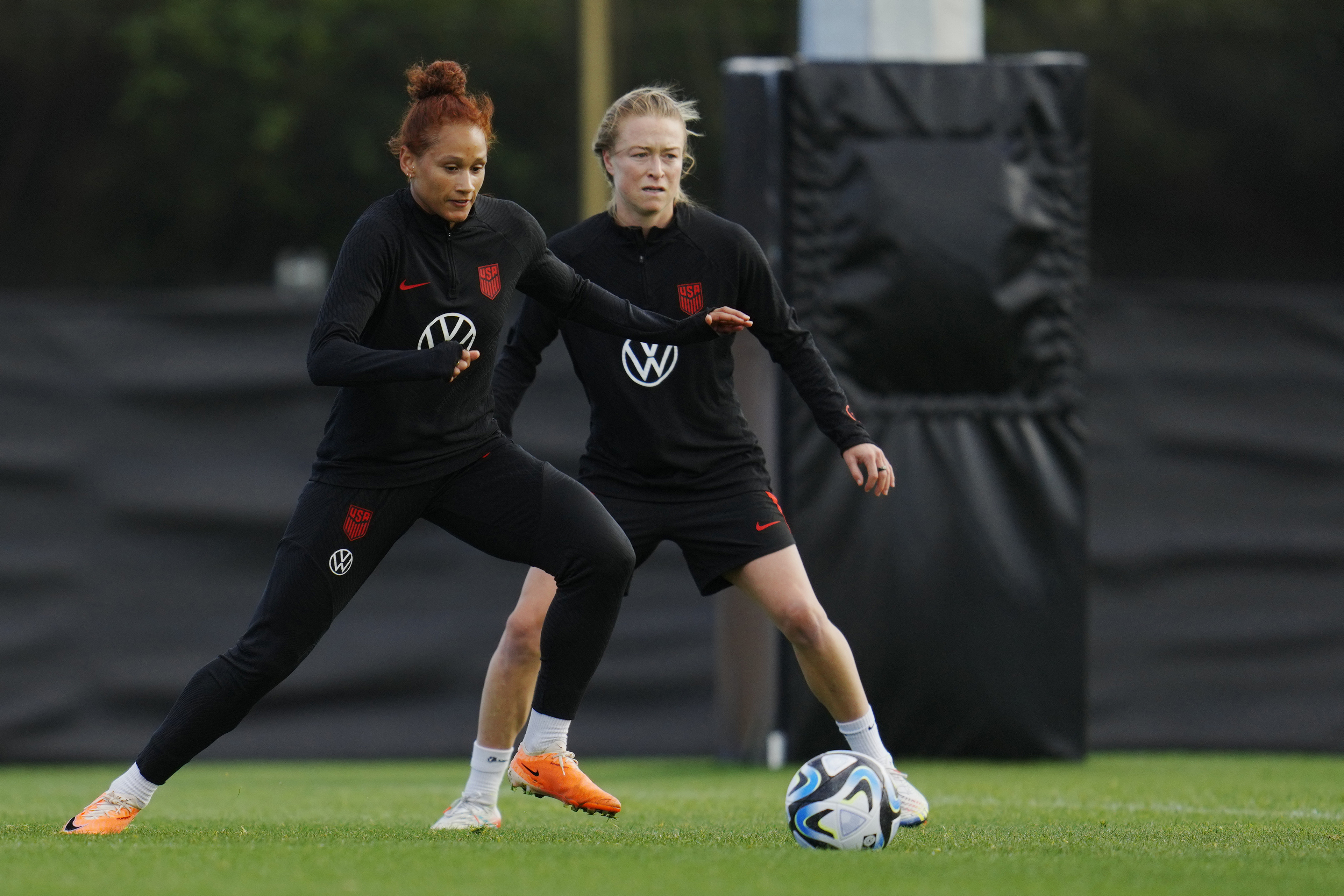 United States' Lynn Williams, left, and Emily Sonnett take part in drills during a FIFA Women's World Cup team practice at Bay City Park in Auckland, New Zealand, Sunday, July 23, 2023.