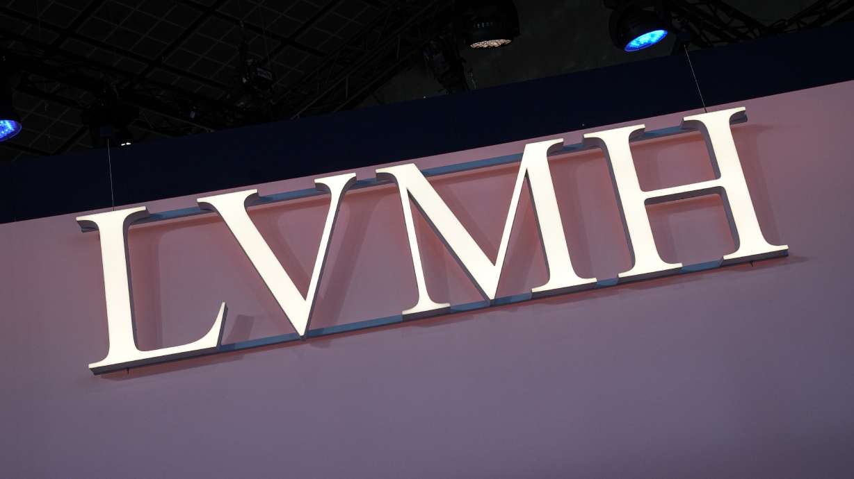 FILE - The LVMH logo is photographed at the Vivatech show in Paris, June 15, 2023. The world’s biggest luxury group, LVMH Moët Hennessy Louis Vuitton, officially announced a sponsorship deal Monday, July 24, 2023 with the 2024 Paris Olympics and Paralympics, joining the ranks of top-tier French sponsors such as banking group BPCE, pharmaceutical maker Sanofi and supermarket operator Carrefour.