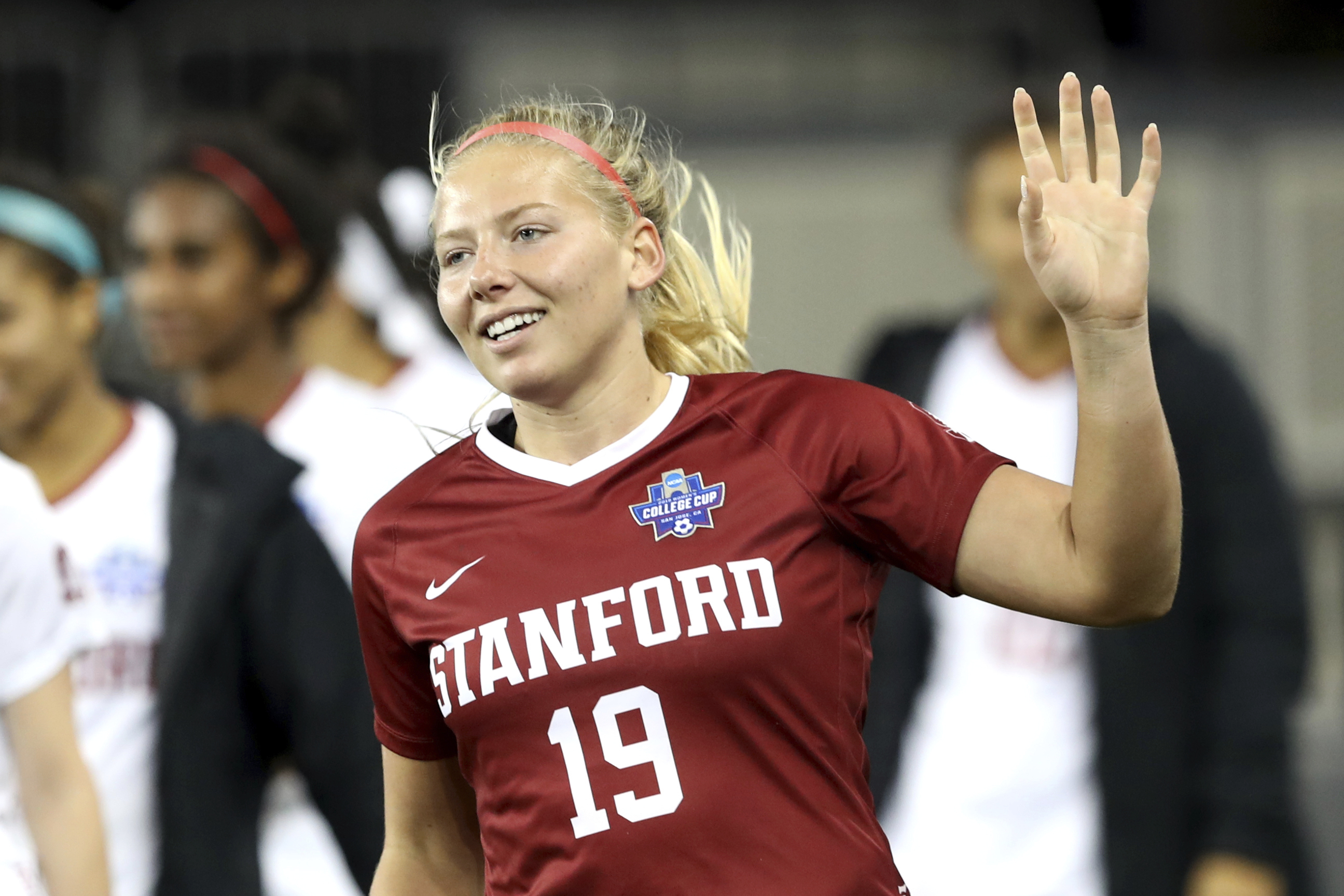 FILE - Stanford goalkeeper Katie Meyer (19) acknowledges the crowd after the team's 4-1 win over UCLA in a semifinal of the NCAA Division I women's soccer tournament in San Jose, Calif., on Dec. 6, 2019. 