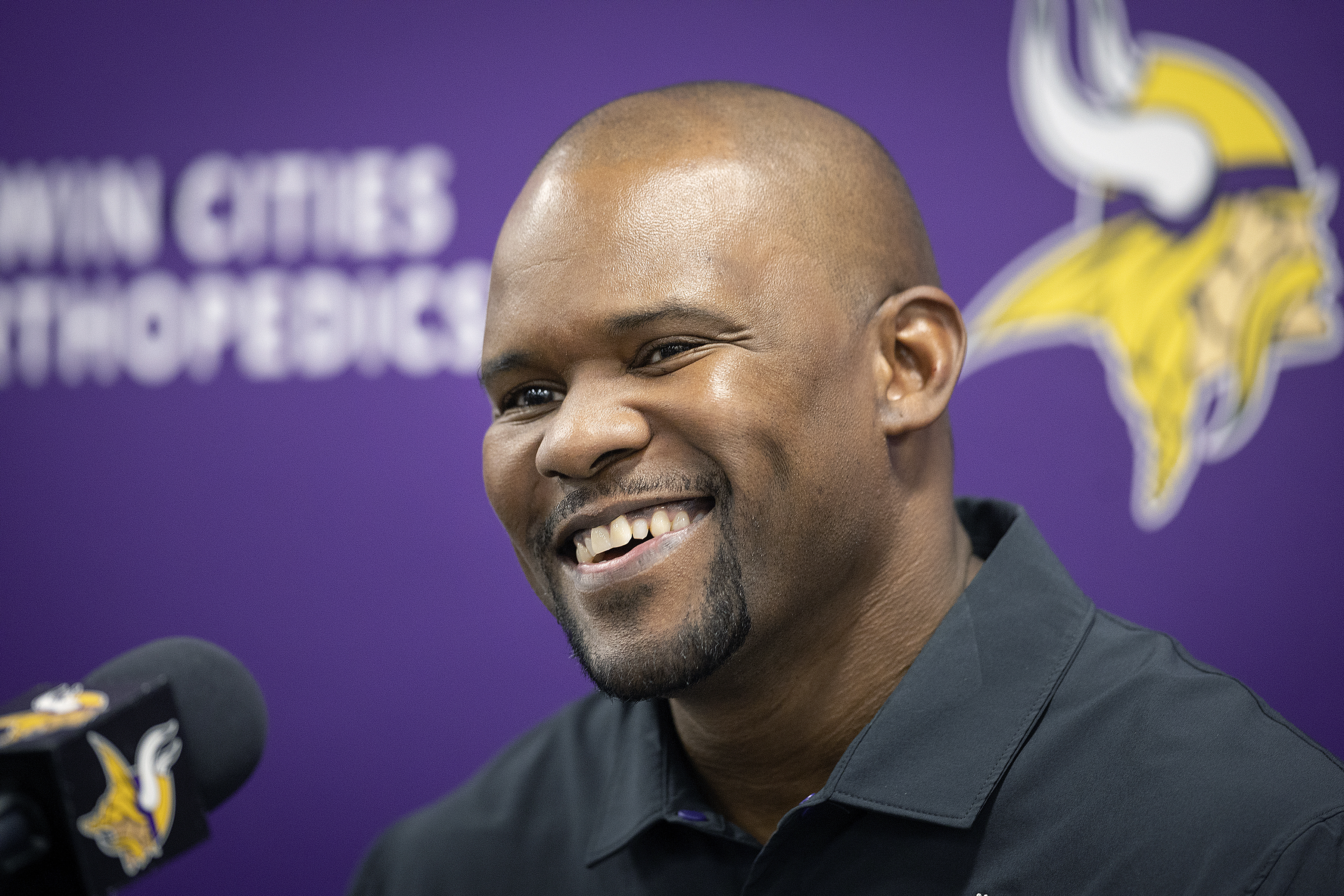 FILE - Minnesota Vikings new defensive coordinator Brian Flores is introduced during an NFL football news conference, Wednesday, Feb. 15, 2023, in Eagan, Minn. A federal judge said Tuesday, July 25, that she’s not changing her decision to let NFL coach Brian Flores put the league and three of its teams on trial over his claims that he and other Black coaches face discrimination./Star Tribune via AP, File)