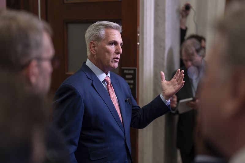 Speaker of the House Kevin McCarthy, R-Calif., talks to reporters outside his office about calls for an impeachment inquiry of President Joe Biden, at the Capitol in Washington, Tuesday.