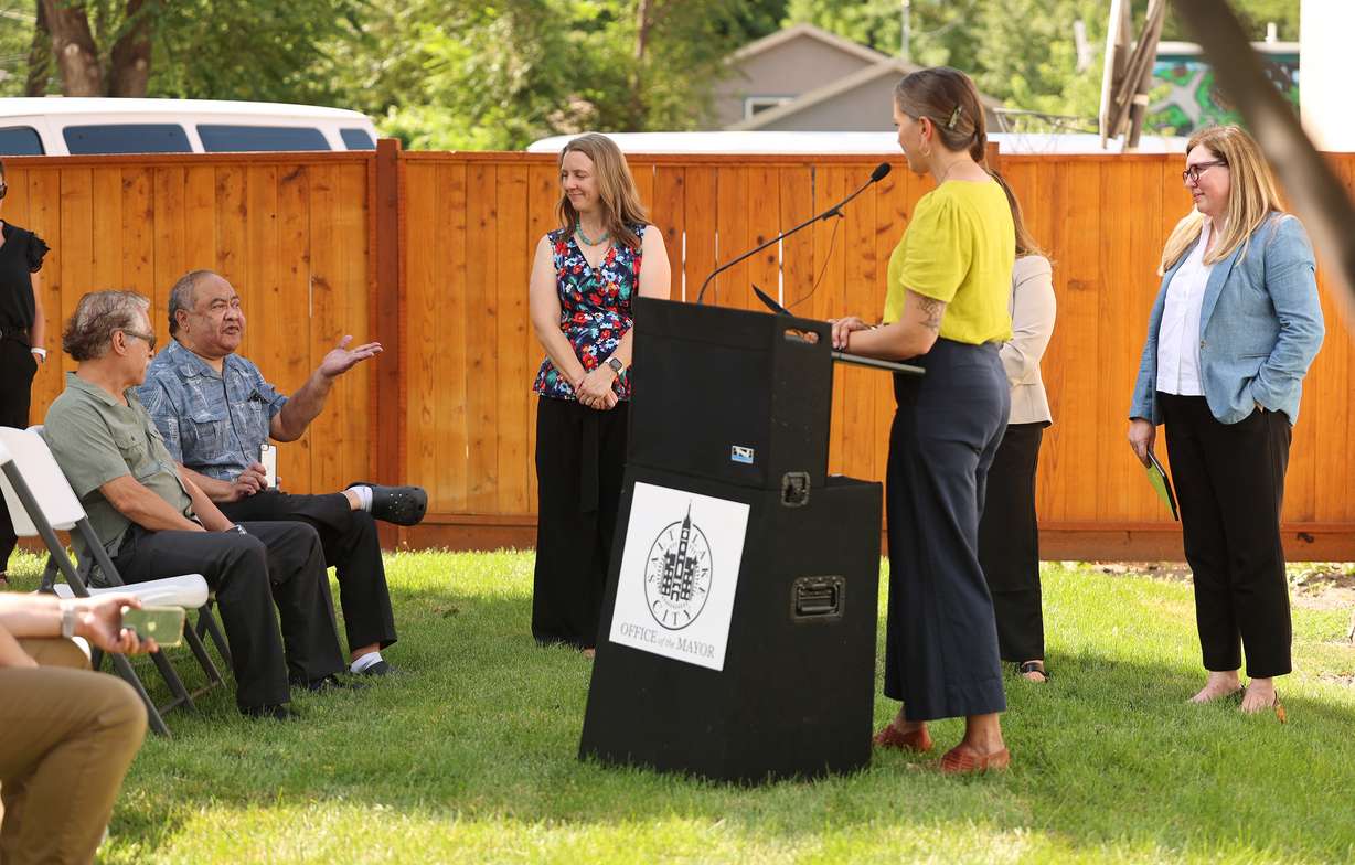 Poplar Grove resident Alama Uluave questions Salt Lake City Mayor Erin Mendenhall during an event at NeighborWorks in Salt Lake City on Tuesday. Federal, state and local officials listened to community concerns and shared information about EPA support and grant opportunities and presented the initial results of an environmental justice assessment focused on westside neighborhoods.