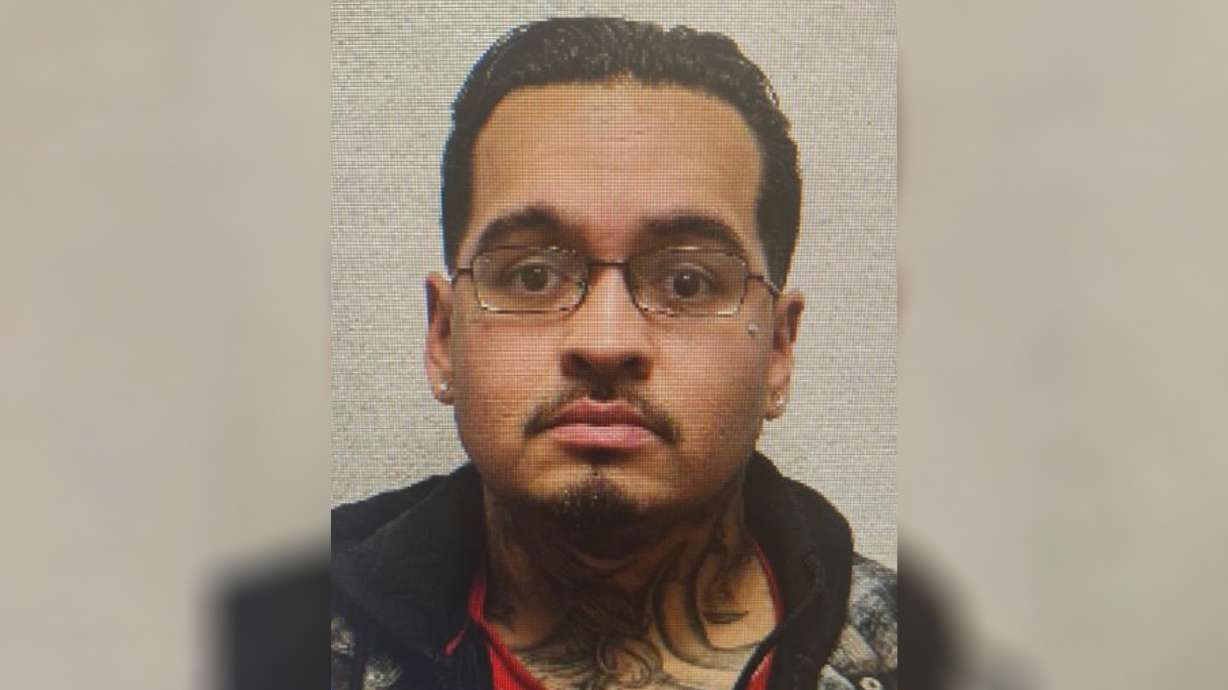 Solomon Lee Johnson was convicted of murder more than 20 years ago and was paroled from a life prison sentence. He was arrested late Wednesday in connection with a new violent crime in Provo and charged with three felonies Friday.