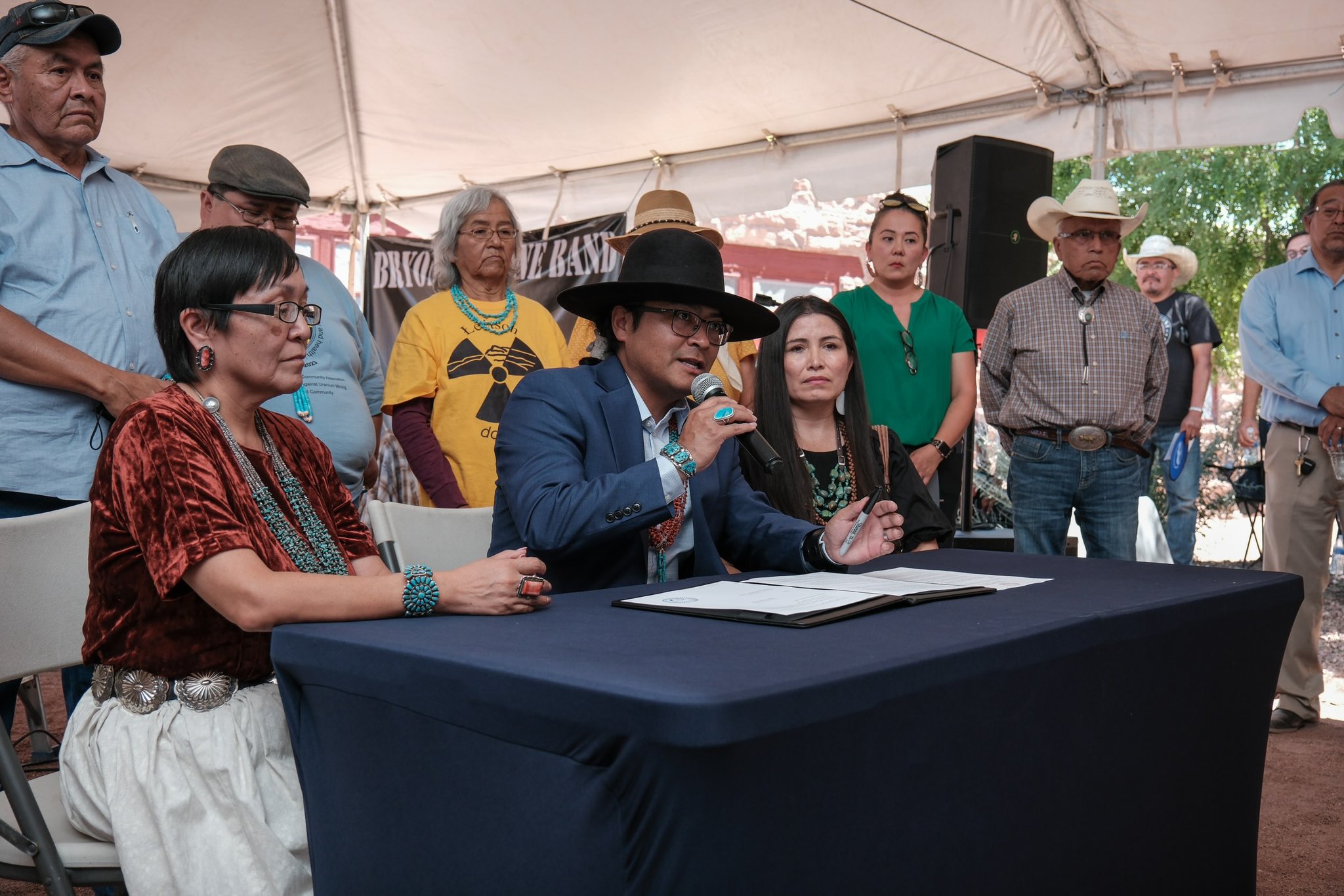 Navajo Nation President Buu Nygren signs an executive order regarding the impacts of abandoned uranium mines. He recently spoke out against the new Hollywood film "Oppenheimer" for leaving out the decades of suffering his people endured as a result of the atomic era.