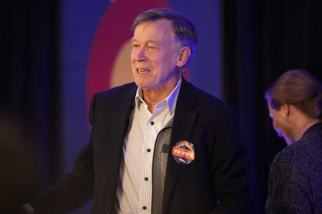 Incumbent U.S. Sen. John Hickenlooper, D-Colo., speaks during an election watch party Nov. 8, 2022, in downtown Denver.
