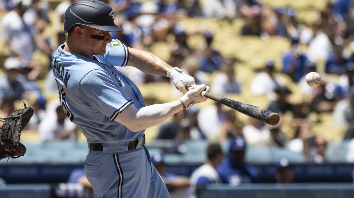 Toronto Blue Jays' Matt Chapman hits a double during the second inning of a baseball game against the Los Angeles Dodgers in Los Angeles, Wednesday, July 26, 2023.