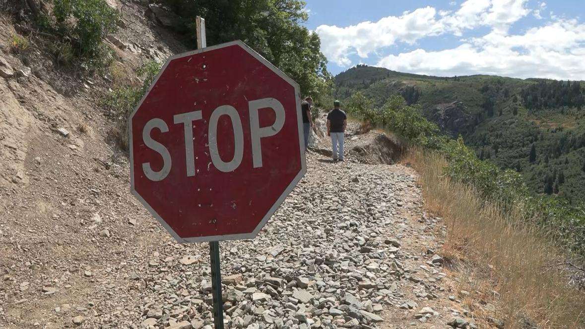 Tyson Zesiger and Luke Sowby installed a stop sign on a trail in Bountiful to warn others of dangerous conditions.