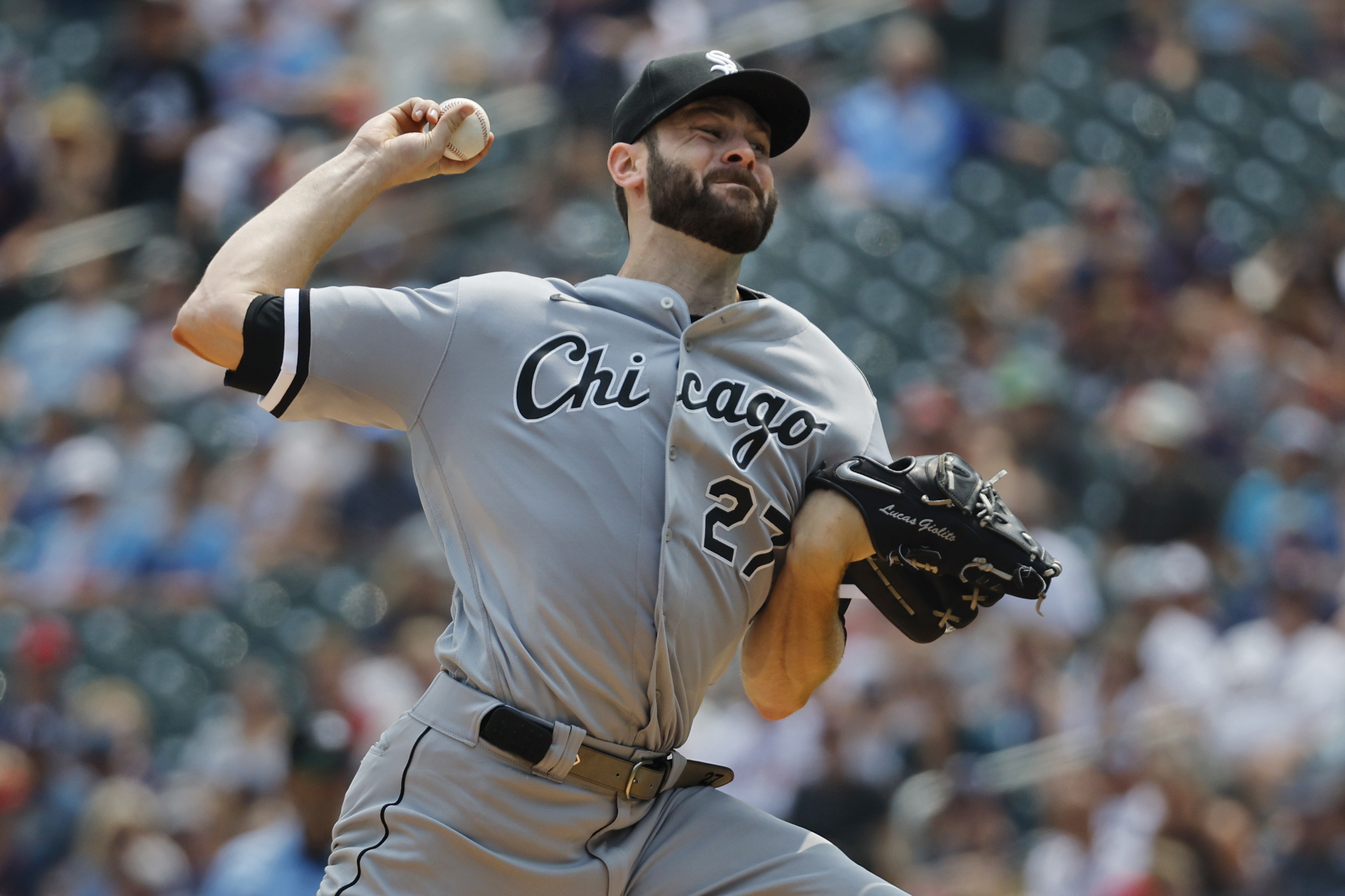 Chicago White Sox starting pitcher Lucas Giolito throws to the Minnesota Twins in the second inning of a baseball game, Sunday, July 23, 2023, in Minneapolis. 