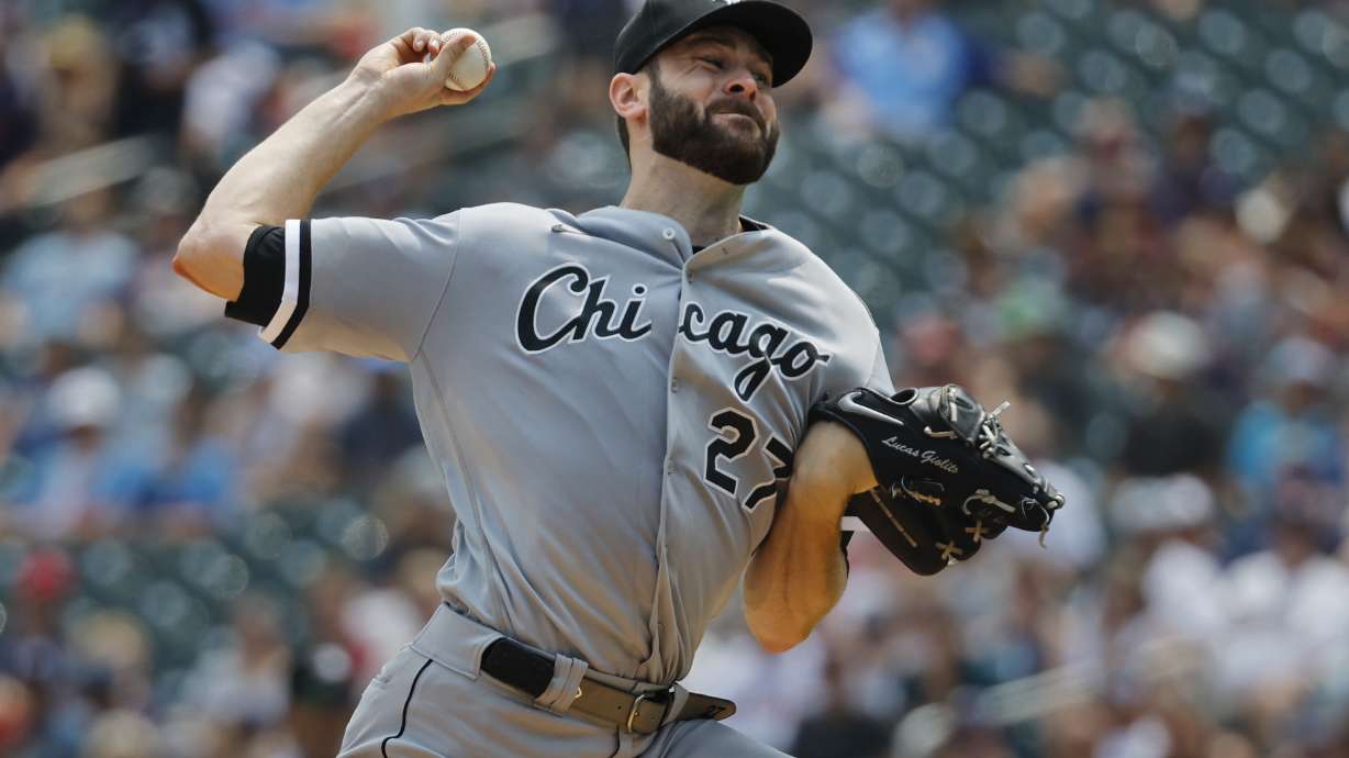 Chicago White Sox starting pitcher Lucas Giolito throws to the Minnesota Twins in the second inning of a baseball game, Sunday, July 23, 2023, in Minneapolis.
