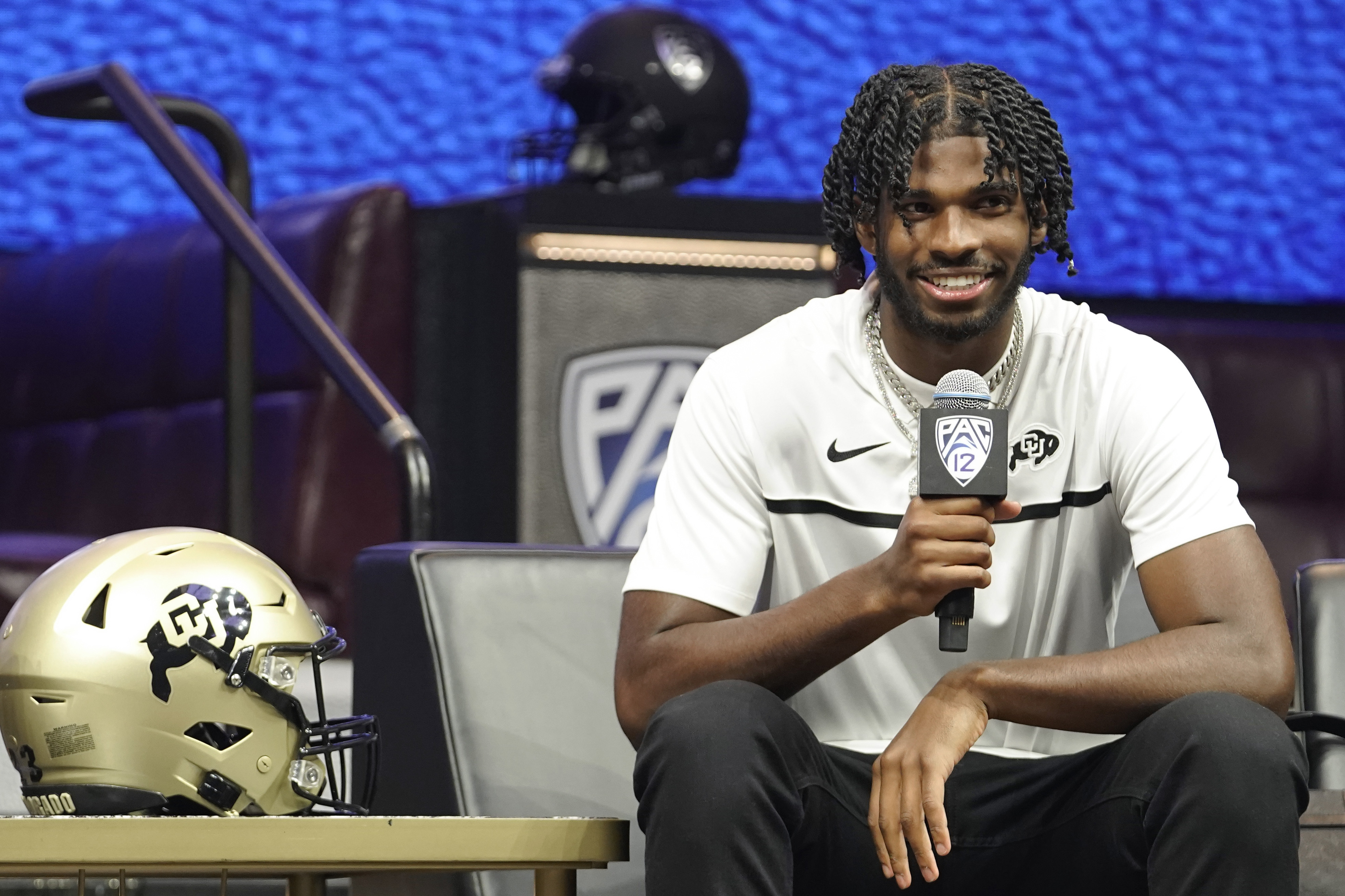 Colorado quarterback Shedeur Sanders speaks at an NCAA college football Pac-12 media day Friday, July 21, 2023, in Las Vegas. 