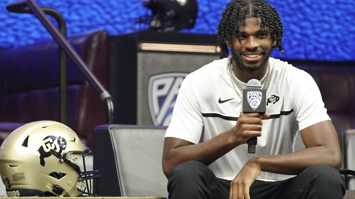 Colorado quarterback Shedeur Sanders speaks at an NCAA college football Pac-12 media day Friday, July 21, 2023, in Las Vegas.