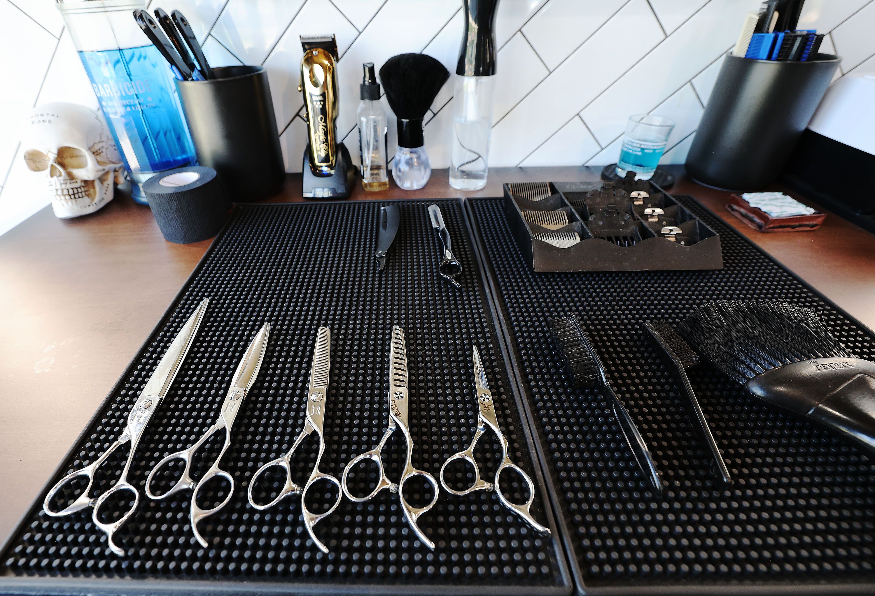 Salt Lake Barber Company scissors in Salt Lake City on Tuesday. A new analysis by Pew Research finds 1 in 5 U.S. workers have the highest exposure to being replaced by emerging artificial intelligence tools. Barbers have the least likelihood.