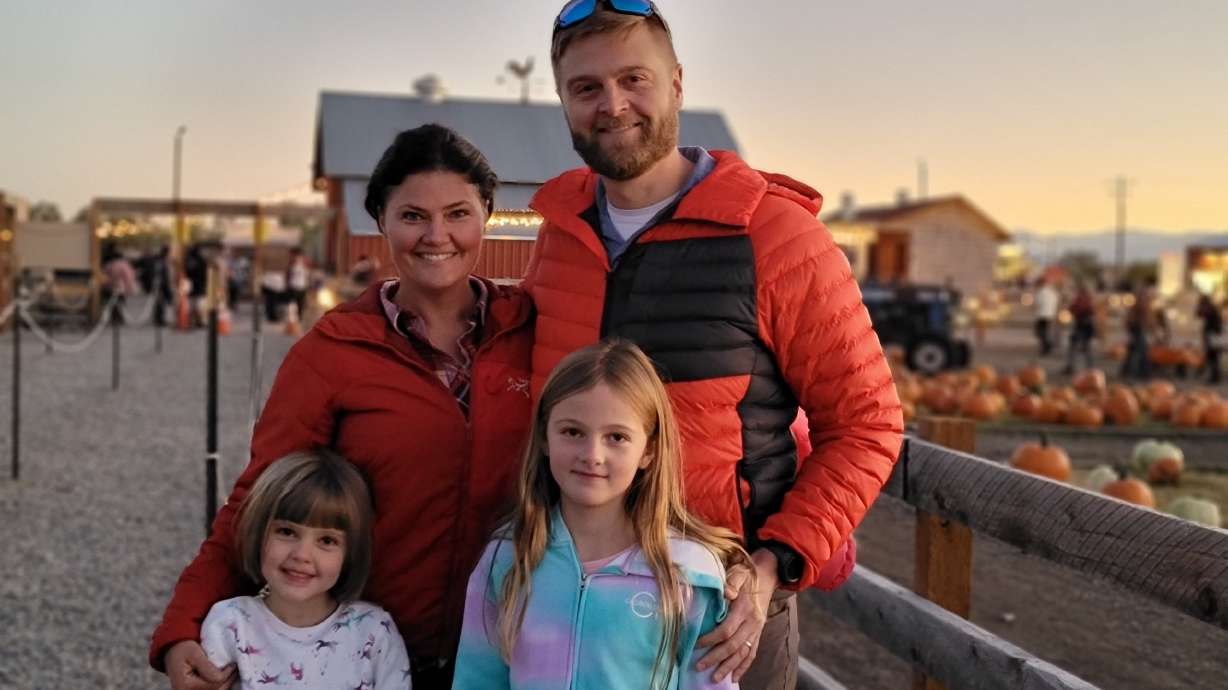 Stephen Smith with his wife, Janine Smith, and two daughters, Lillian and Abigail.