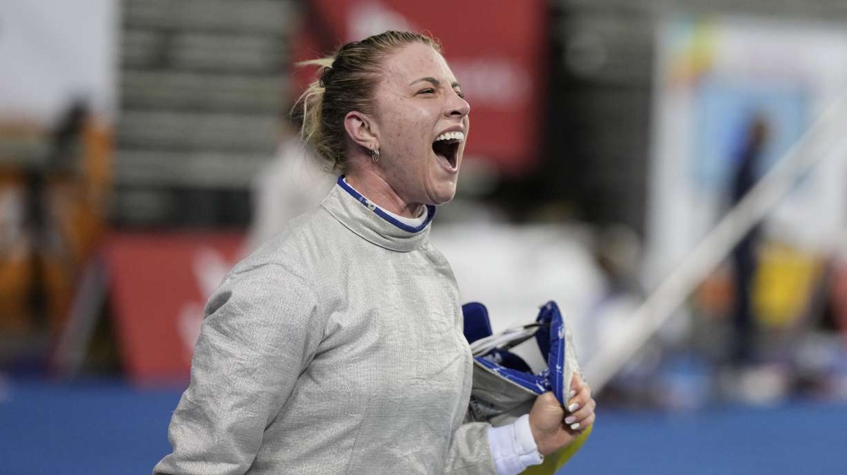 FILE - Olga Kharlan of Ukraine reacts after defeating Cyrielle Rioux of France during the women's FIE fencing sabre grand prix competition in Seoul, South Korea, Saturday, April 29, 2023. Ukraine has signaled it will no longer bar its athletes from competing against Russians who are taking part in sporting events as “neutral athletes." That would be a significant easing of its boycott policy a year before the Paris Olympics.