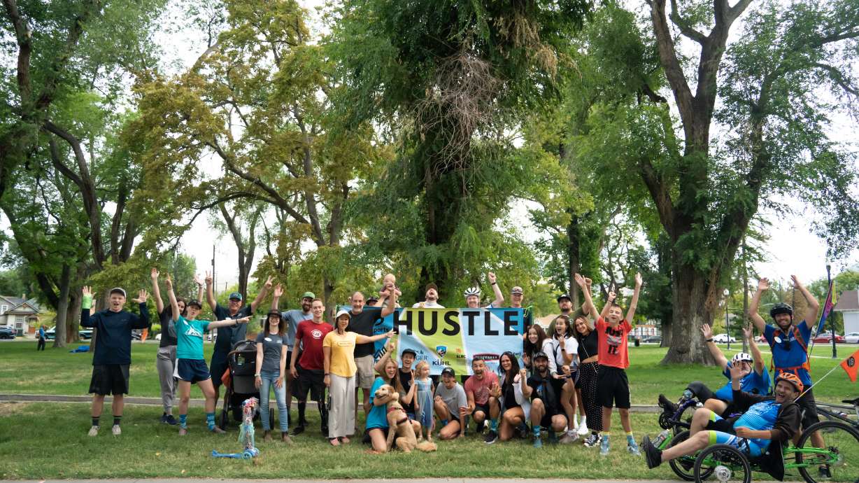 Community members with the Wasatch Adaptive Sports nonprofit organization gather in Liberty Park during the Hustle's kickstarting event last year in August 2022.