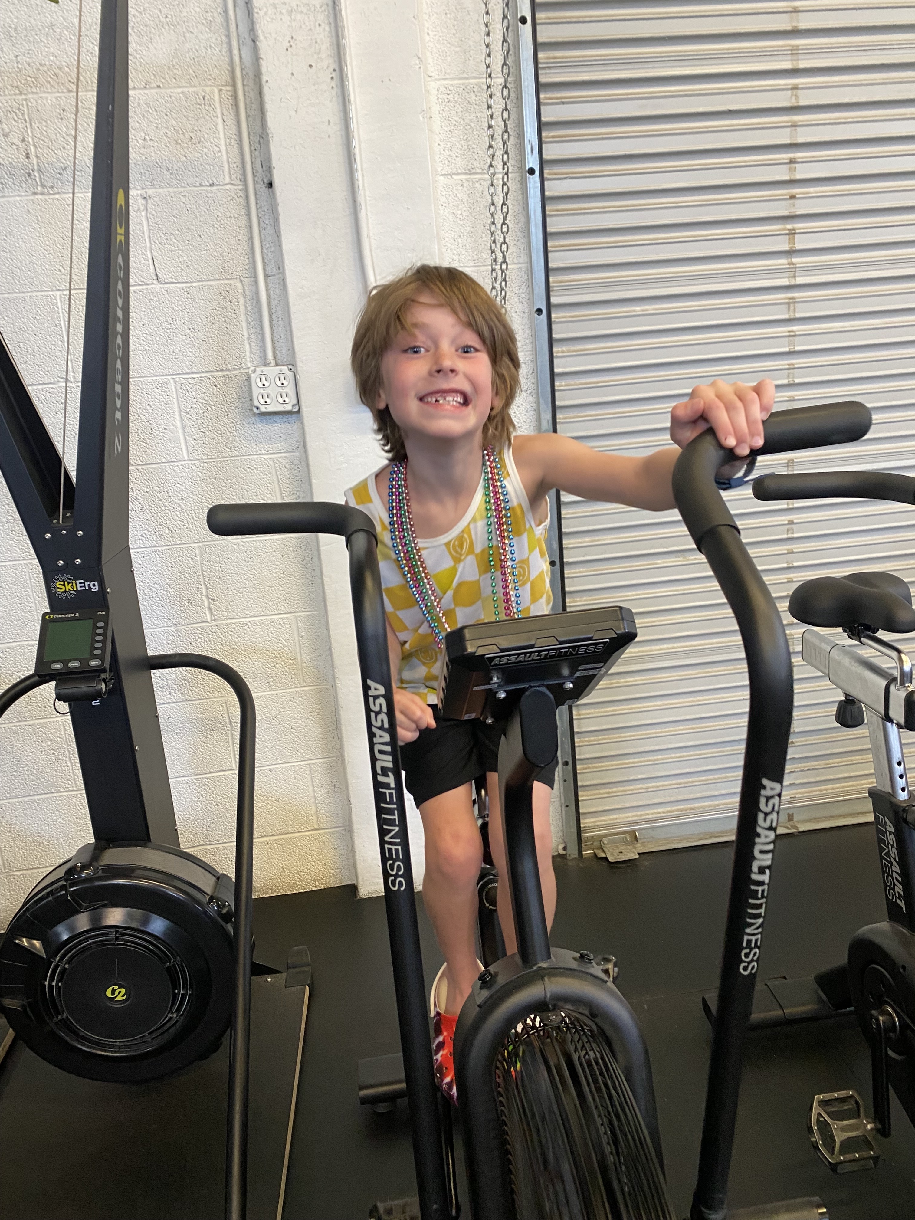 Bear Osoro trains and practices biking for the Hustle event.