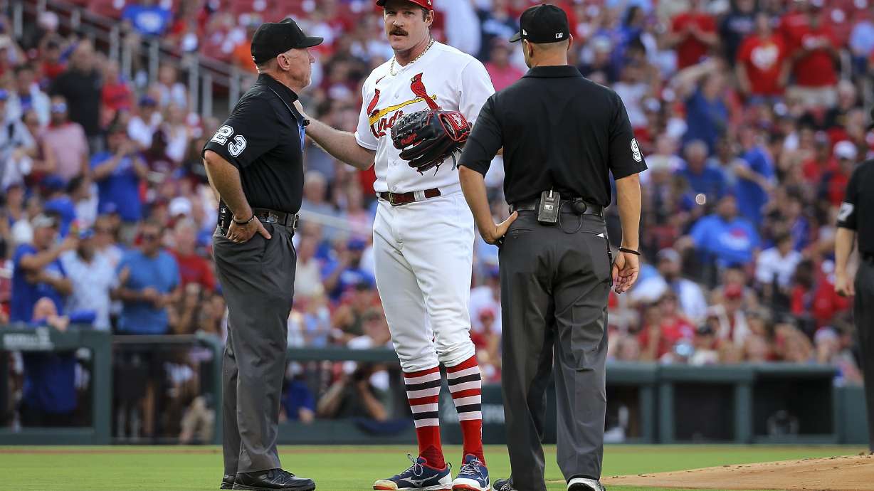 St. Louis Cardinals starting pitcher Miles Mikolas (39) argues with umpires Lance Barksdale (23) and Will Little (93) after being ejected during the first inning of the team's baseball game against the Chicago Cubs on Thursday, July 27, 2023, in St. Louis.