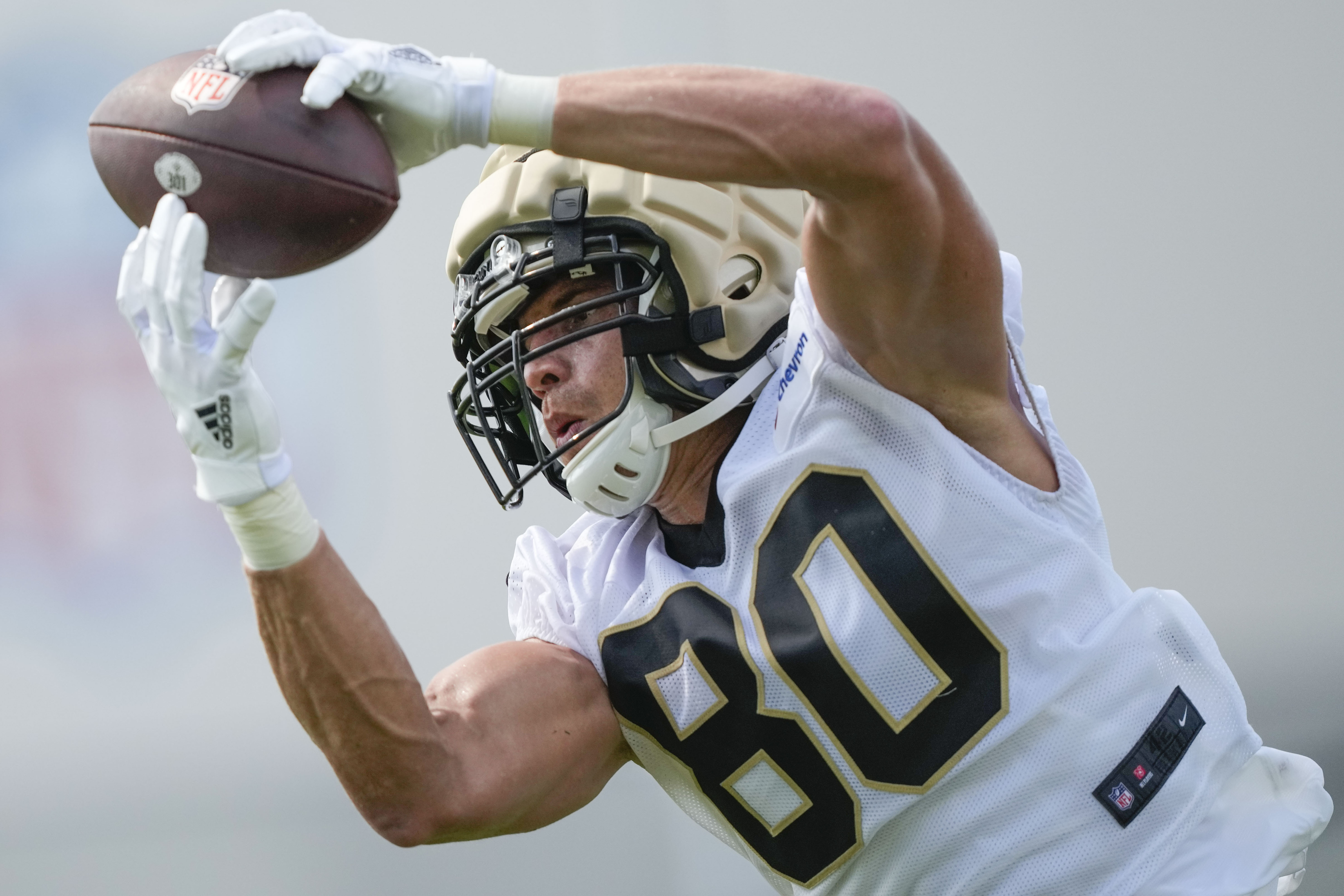 New Orleans Saints tight end Jimmy Graham (80) pulls in a pass at the team's NFL football training camp in Metairie, La., Wednesday, July 26, 2023. 