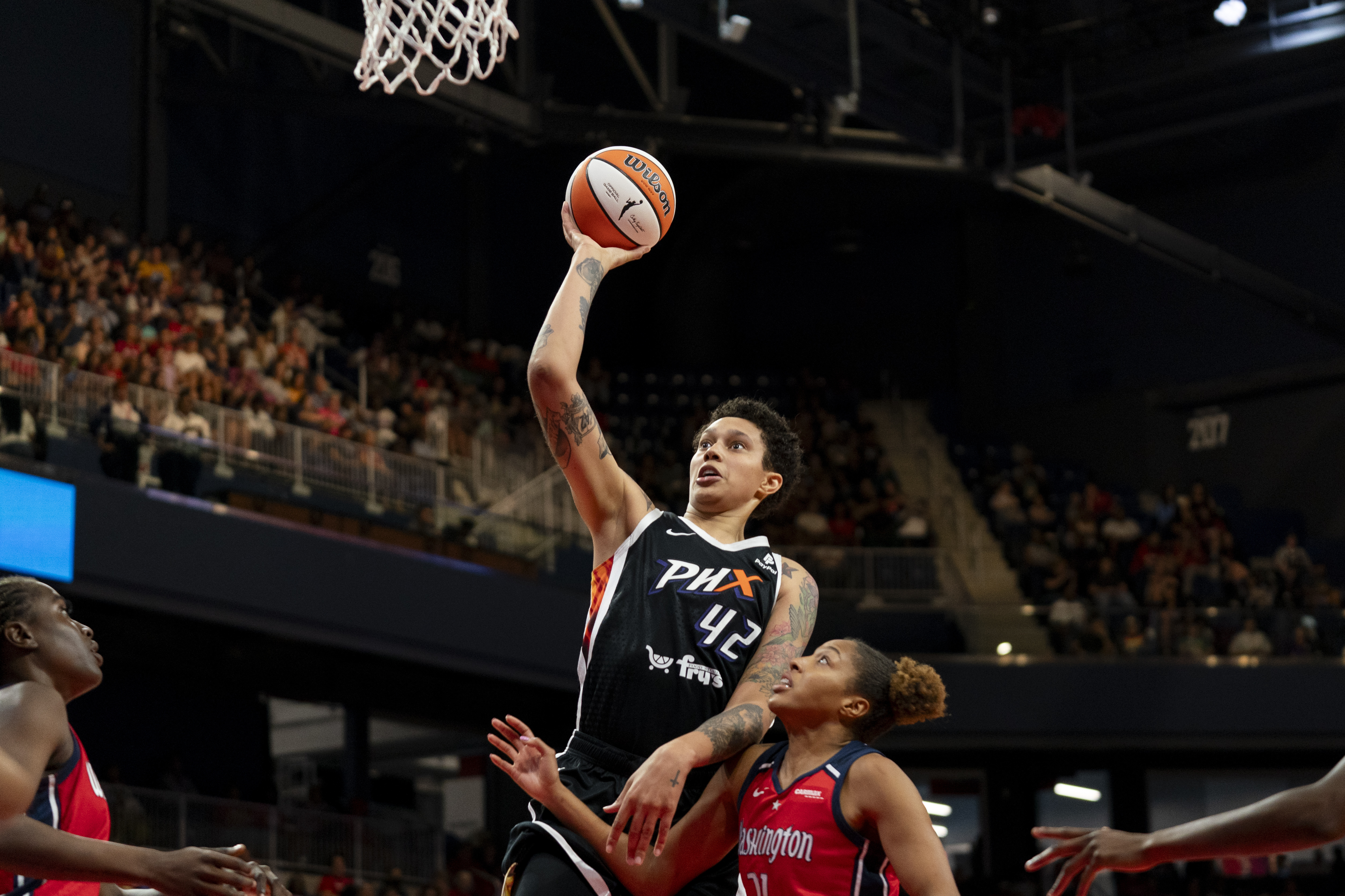 Phoenix Mercury center Brittney Griner (42) makes a layup during the second quarter of a WNBA basketball game against the Washington Mystics, Sunday, July 23, 2023, in Washington. 