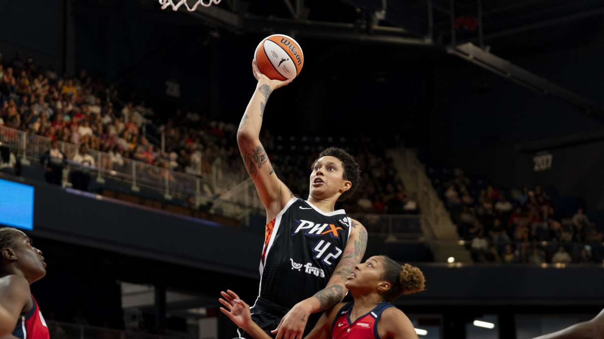 Phoenix Mercury center Brittney Griner (42) makes a layup during the second quarter of a WNBA basketball game against the Washington Mystics, Sunday, July 23, 2023, in Washington.