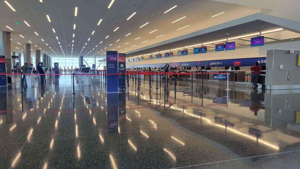 The wide and clutter-free Delta check-in counters at Salt Lake City International Airport.