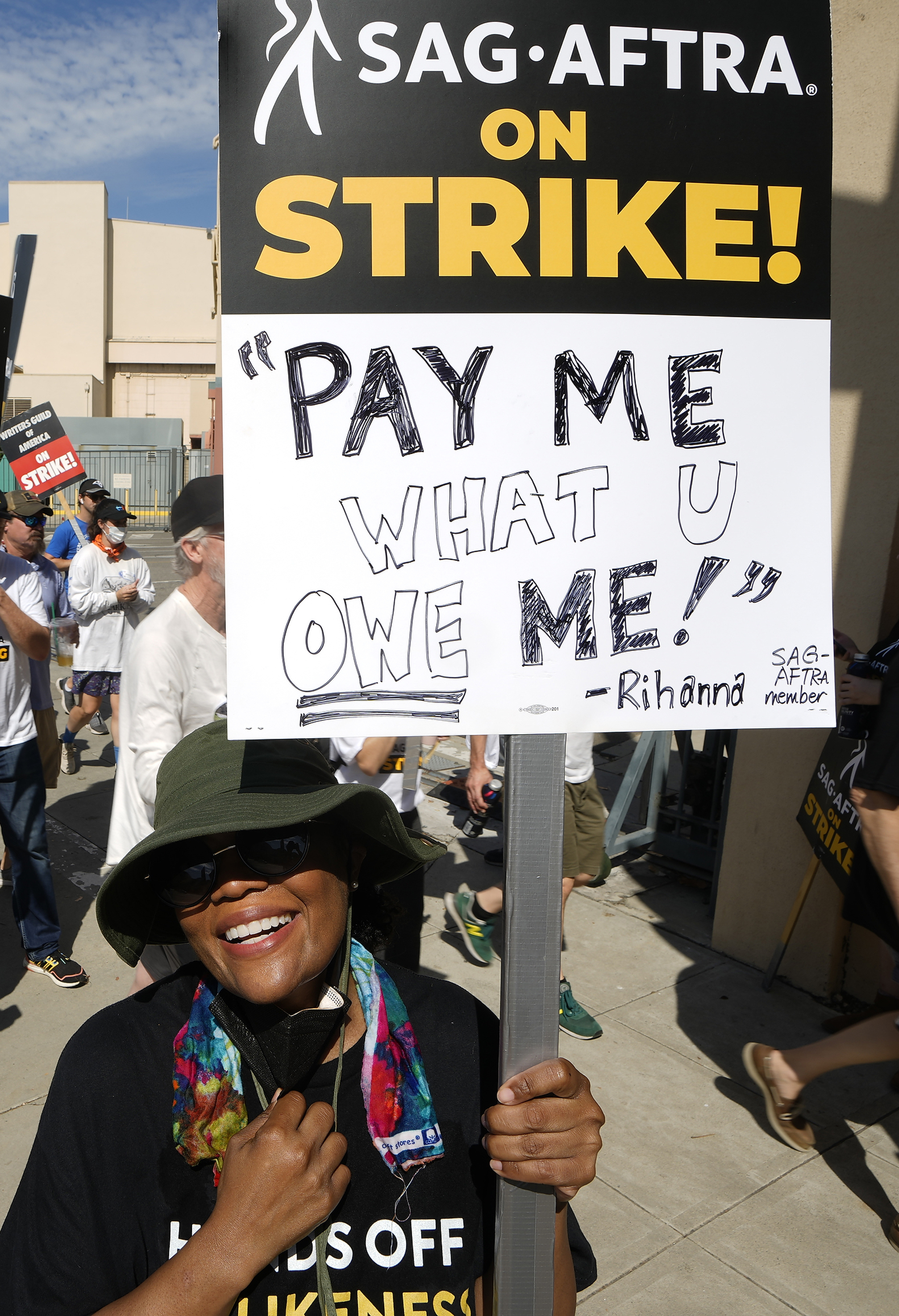 Actor Yvette Nicole Brown walks on a picket line outside Disney studios on Friday in Burbank, California. The actors strike comes more than two months after screenwriters began striking in their bid to get better pay and working conditions.