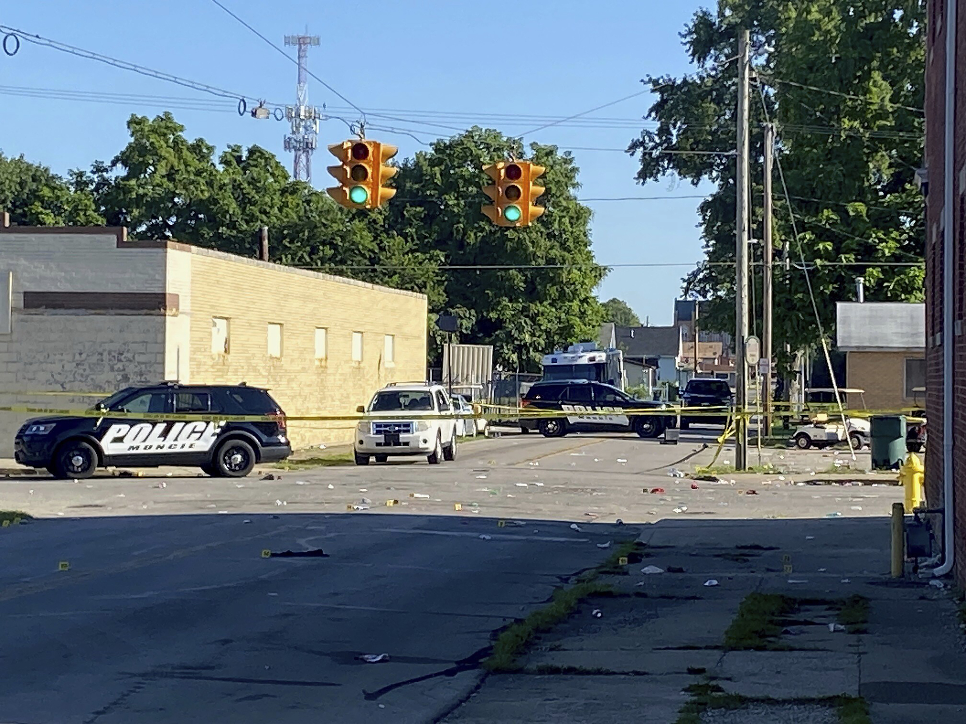 Police remain at the scene of a shooting on Sunday in Muncie, Indiana. Police said in a news release that there was no active threat to the community and that “multiple” victims were injured, including some critically. 