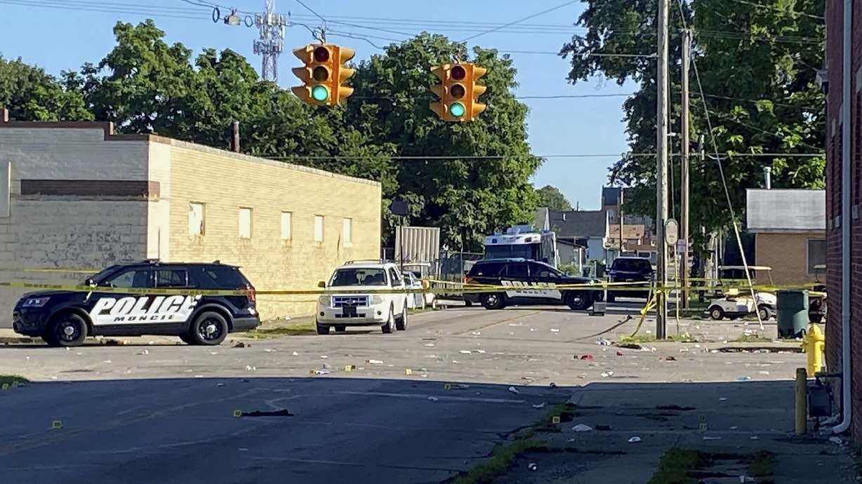 Police remain at the scene of a shooting on Sunday in Muncie, Indiana. Police said in a news release that there was no active threat to the community and that “multiple” victims were injured, including some critically.
